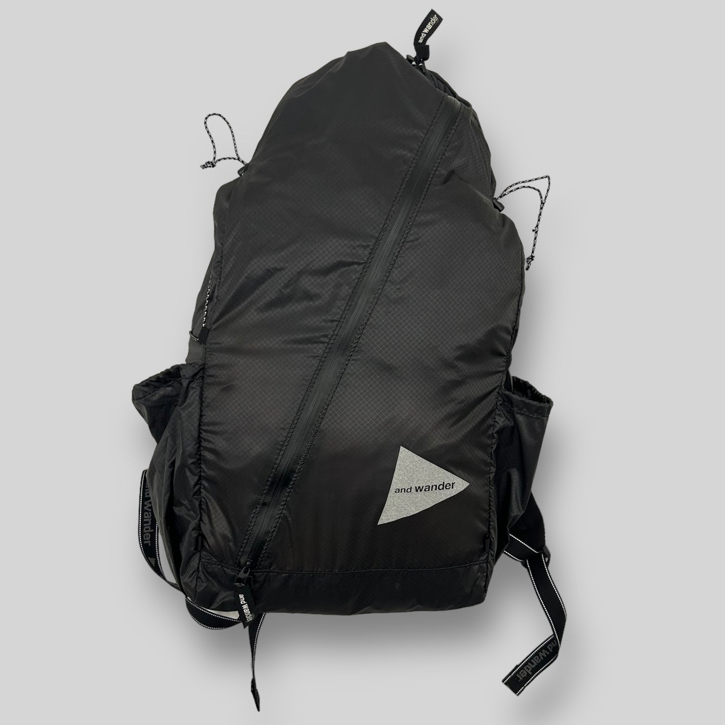 And Wander SIL Diagonal Zip Back Pack Black