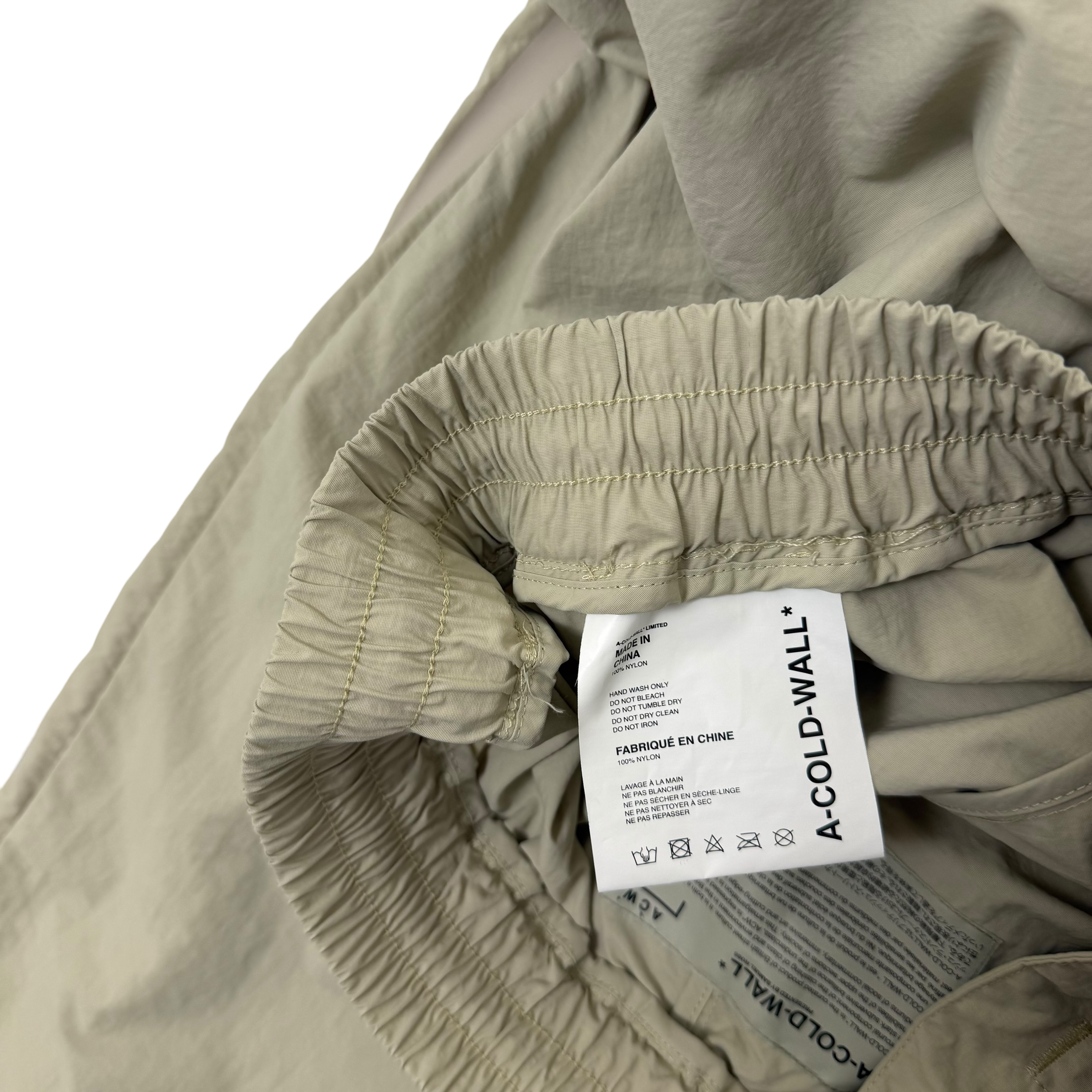 A-COLD-WALL* (ACW) Bracket Taped Track Pants Cream (Size M)