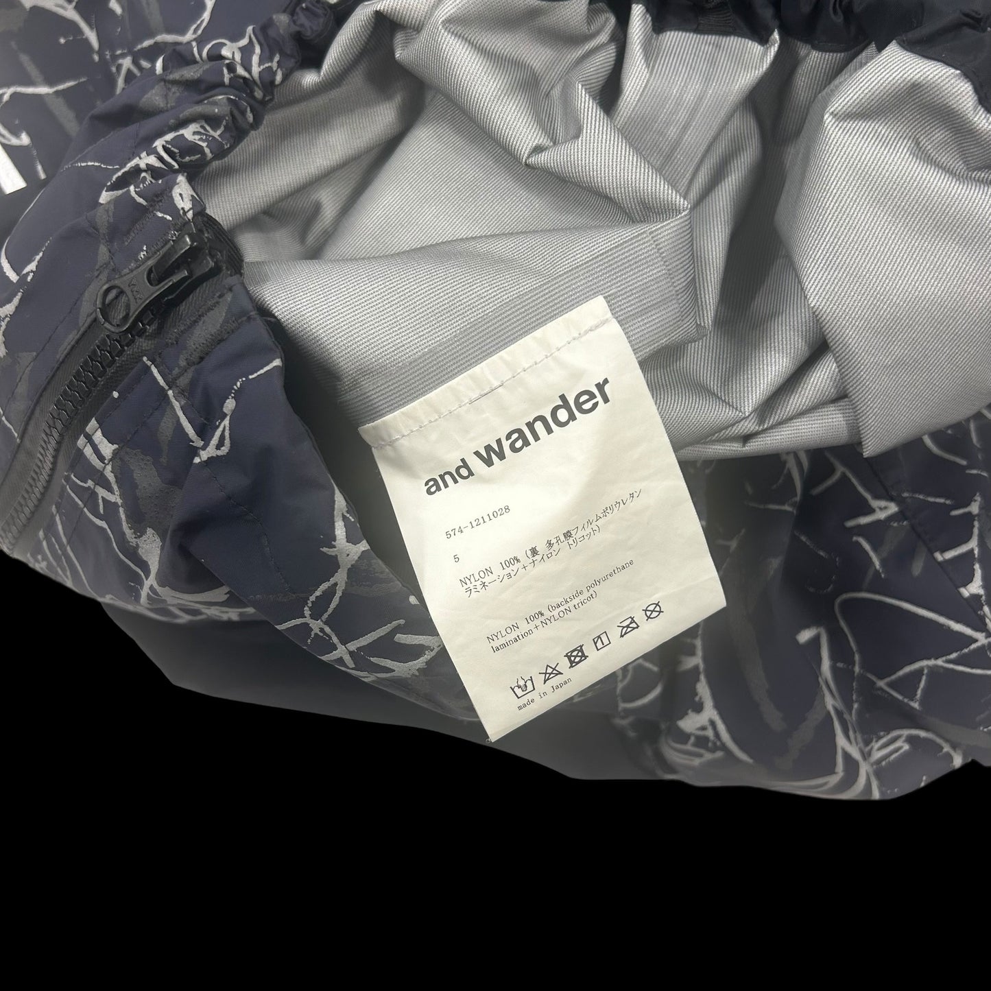 And Wander Reflective Printed Rain Jacket ‘Charcoal’(Fits XL)