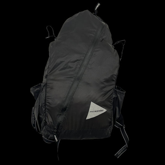 And Wander SIL Diagonal Zip Back Pack Black