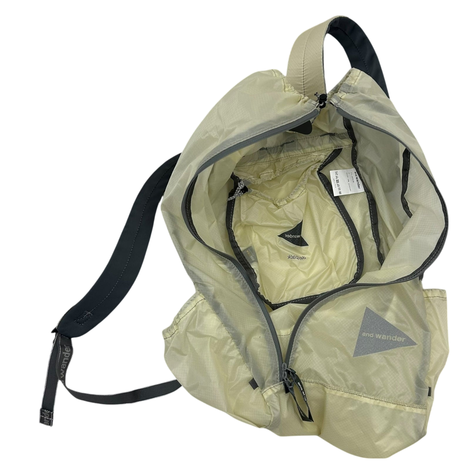 And Wander SIL Diagonal Zip Back Pack Cream