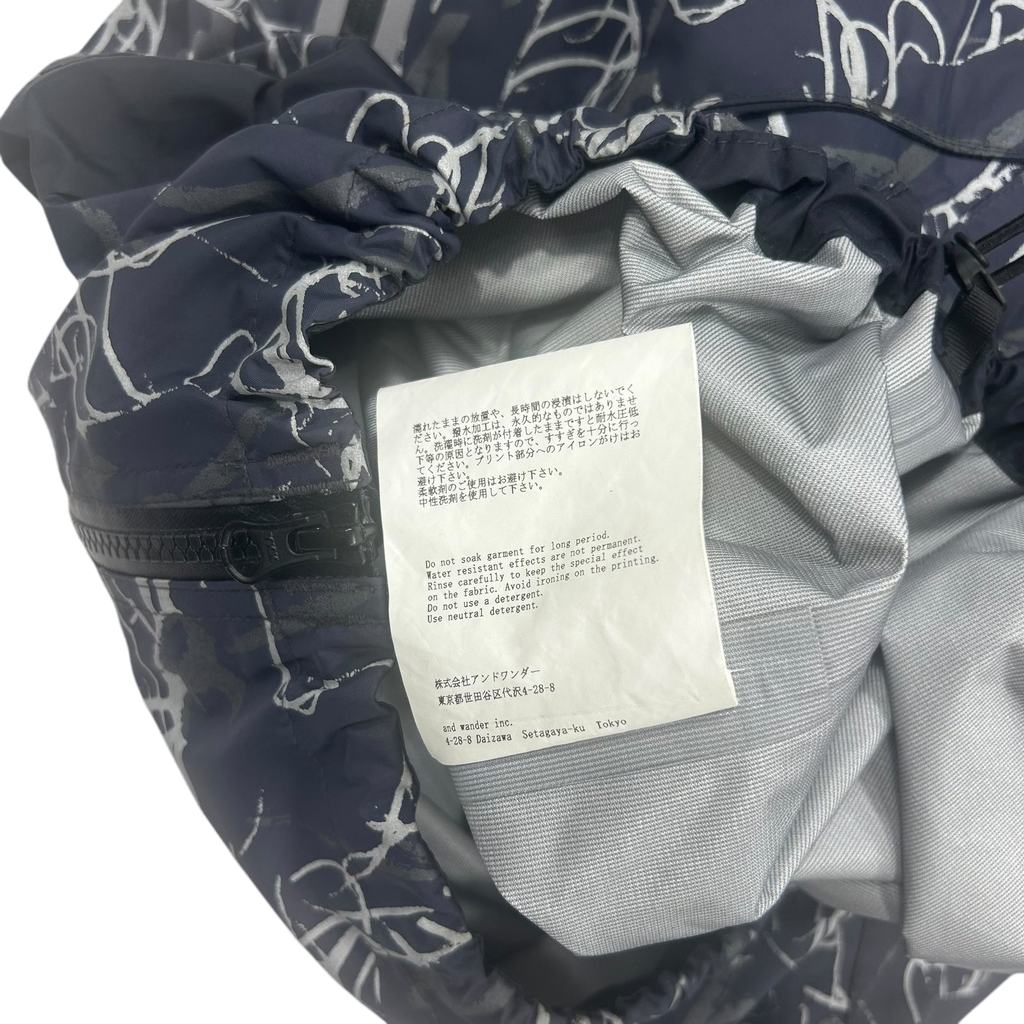 And Wander Reflective Printed Rain Jacket ‘Charcoal’(Fits XL)