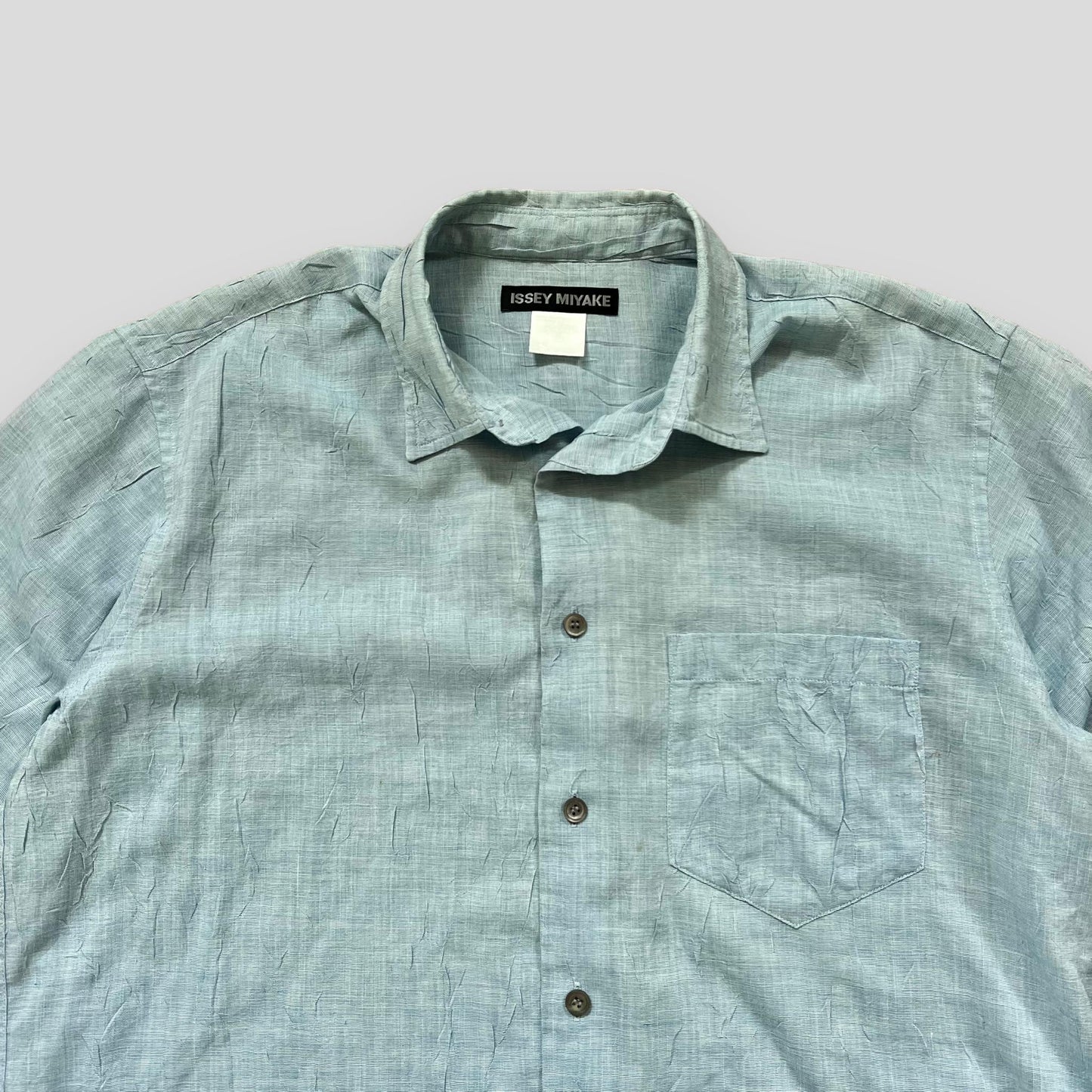 Vintage Issey Miyake Wrinkle-Effect Short Sleeve Blue Shirt (Fits L)