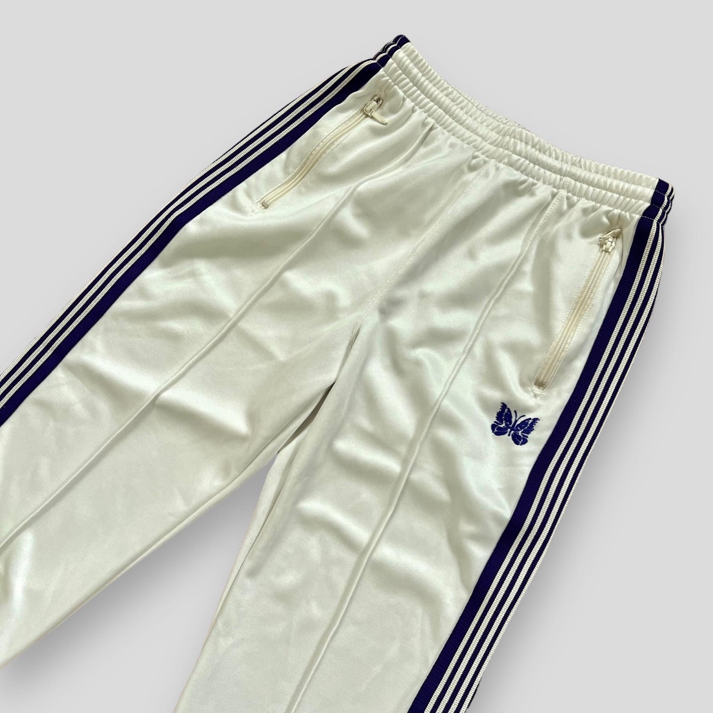 Needles Cream / Purple Poly Smooth Track Pants (Size S)