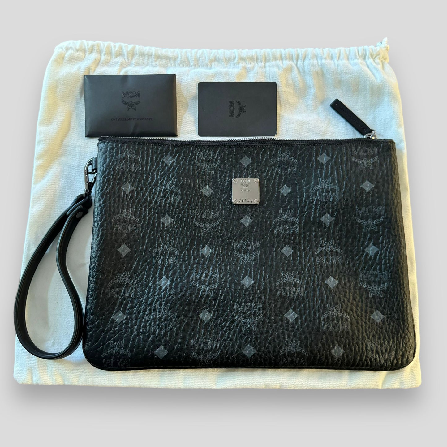 MCM Visetos Pattern Black Leather Clutch Bag