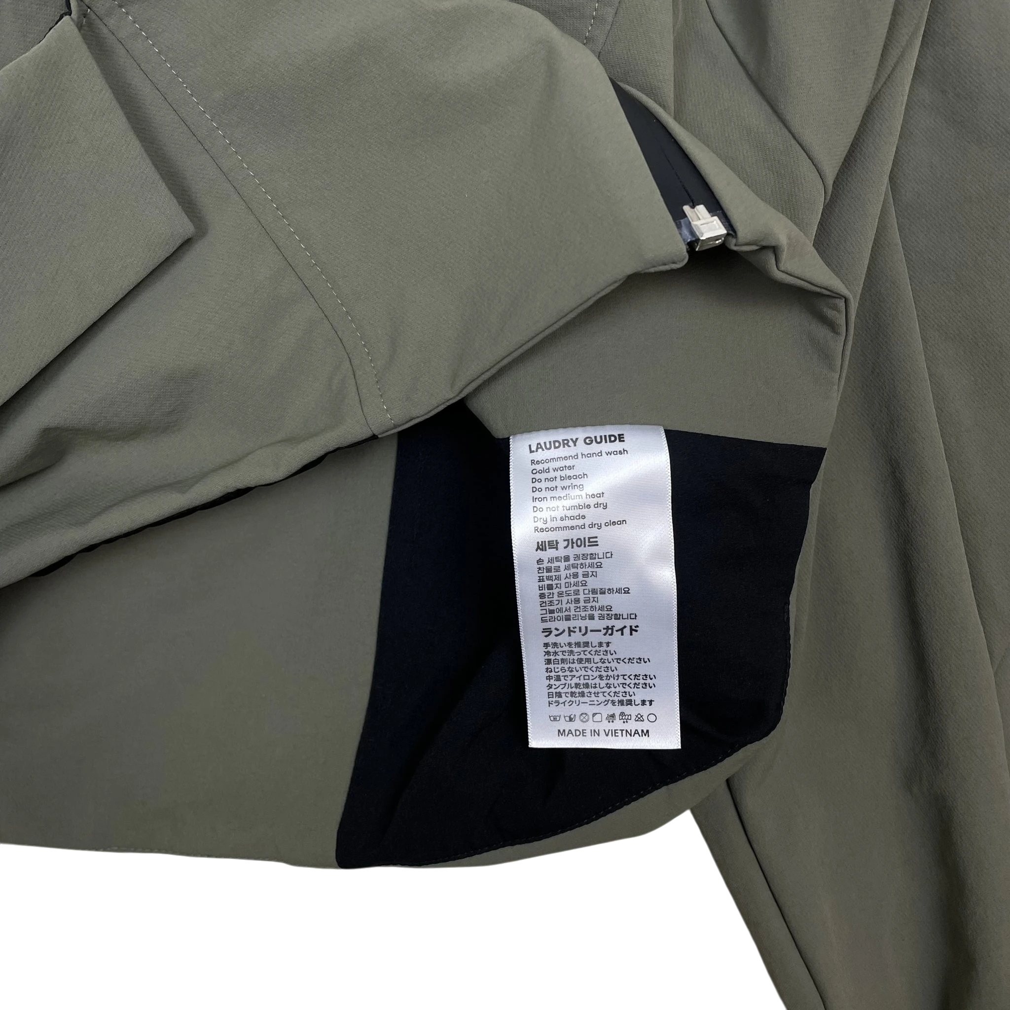 Zenno Archive ACCOX ACX Xirva cropped technical jacket in olive green with interior laundry care label detail