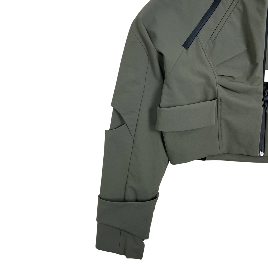 Zenno Archive ACCOX ACX Xirva cropped technical jacket in olive green with utility pockets and structured sleeve detail