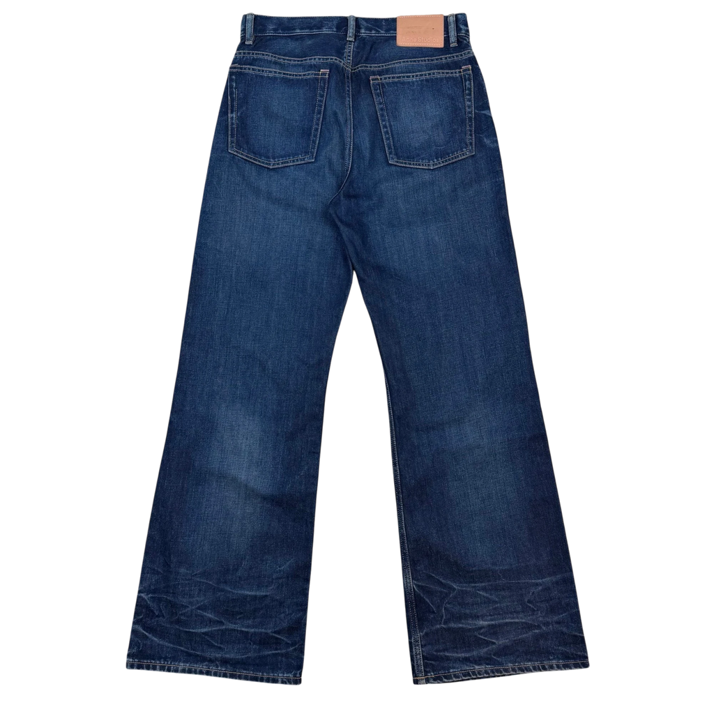 Zenno Archive Acne Studios dark wash denim jeans with whiskering detail and tan leather back patch, back view