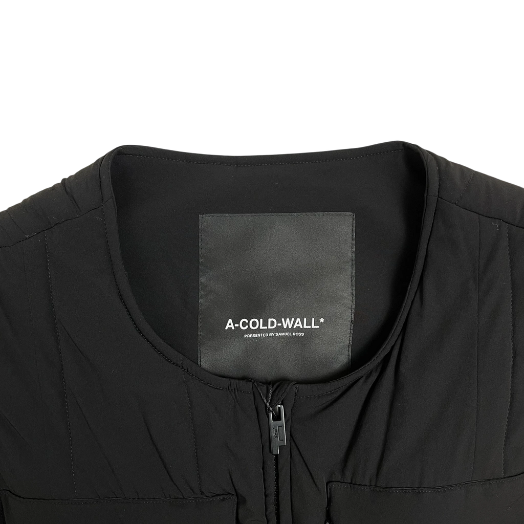 Zenno Archive A-COLD-WALL* black technical puffer vest featuring a branded neck label and front zipper detail