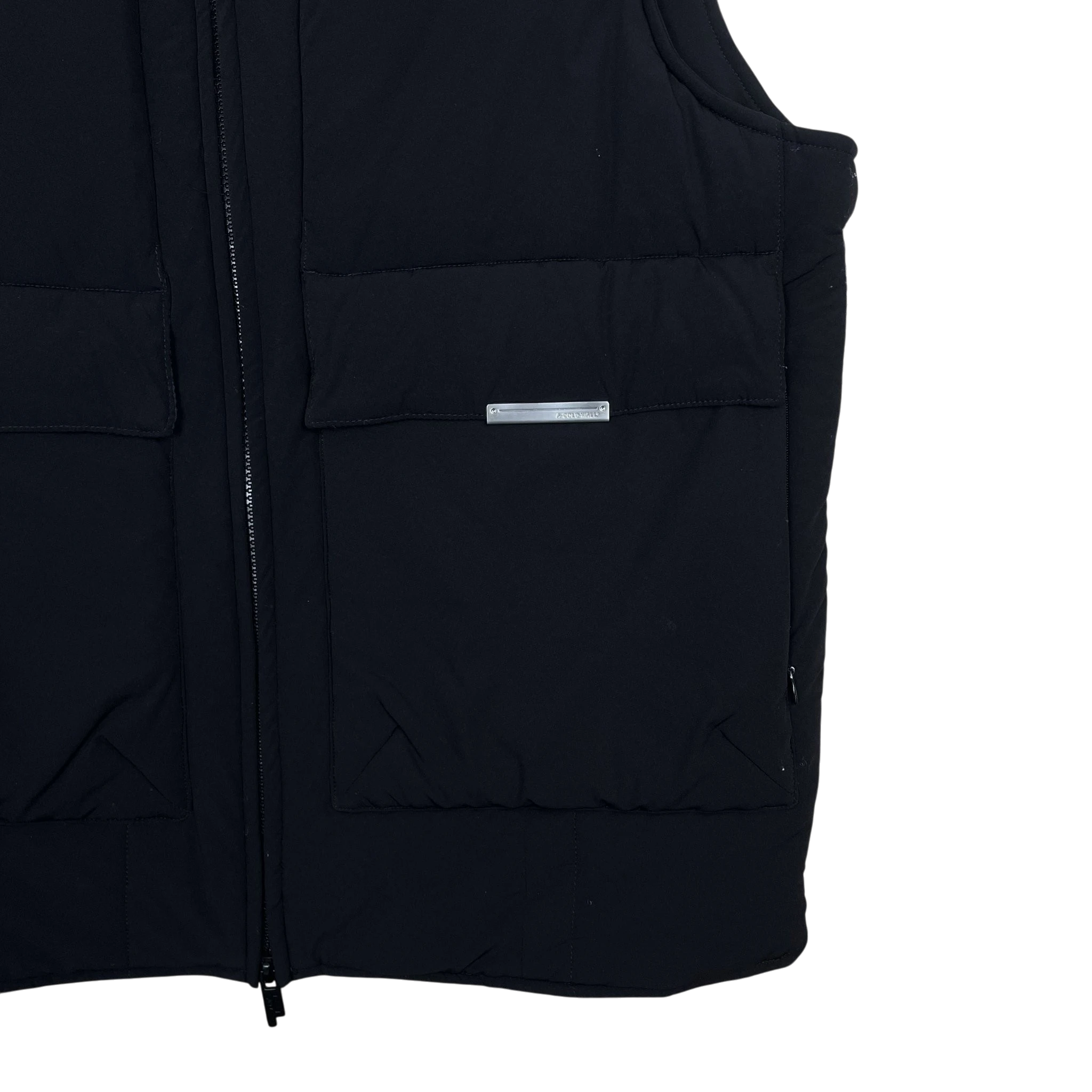 Zenno Archive A-COLD-WALL black technical puffer vest with front pockets and metallic logo plaque detail