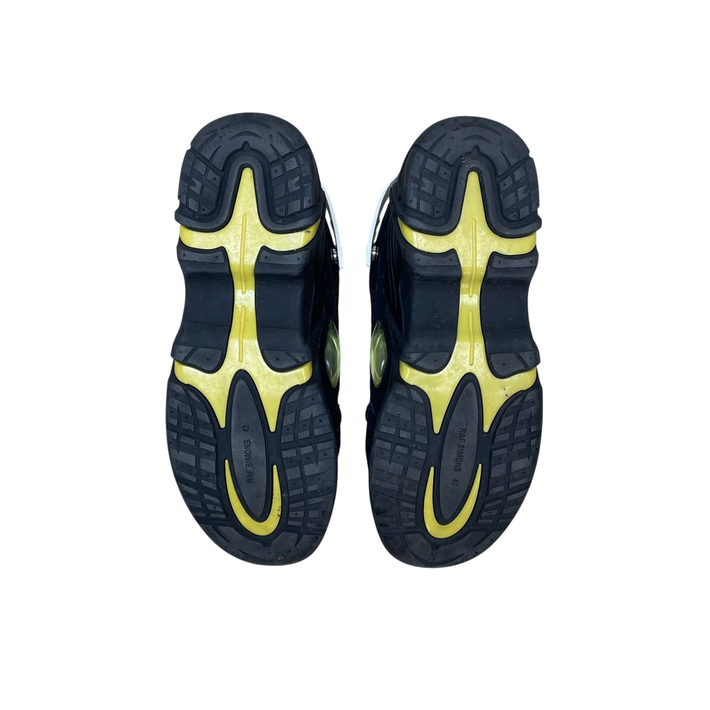 Zenno Archive Adidas x Raf Simons Cylon-21 black suede sneakers showing the yellow and black rubber outsoles