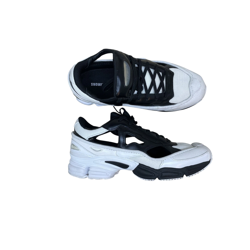 Zenno Archive Adidas x Raf Simons AW18 Ozweego Replicant sneakers in black and cream with cutout side details.