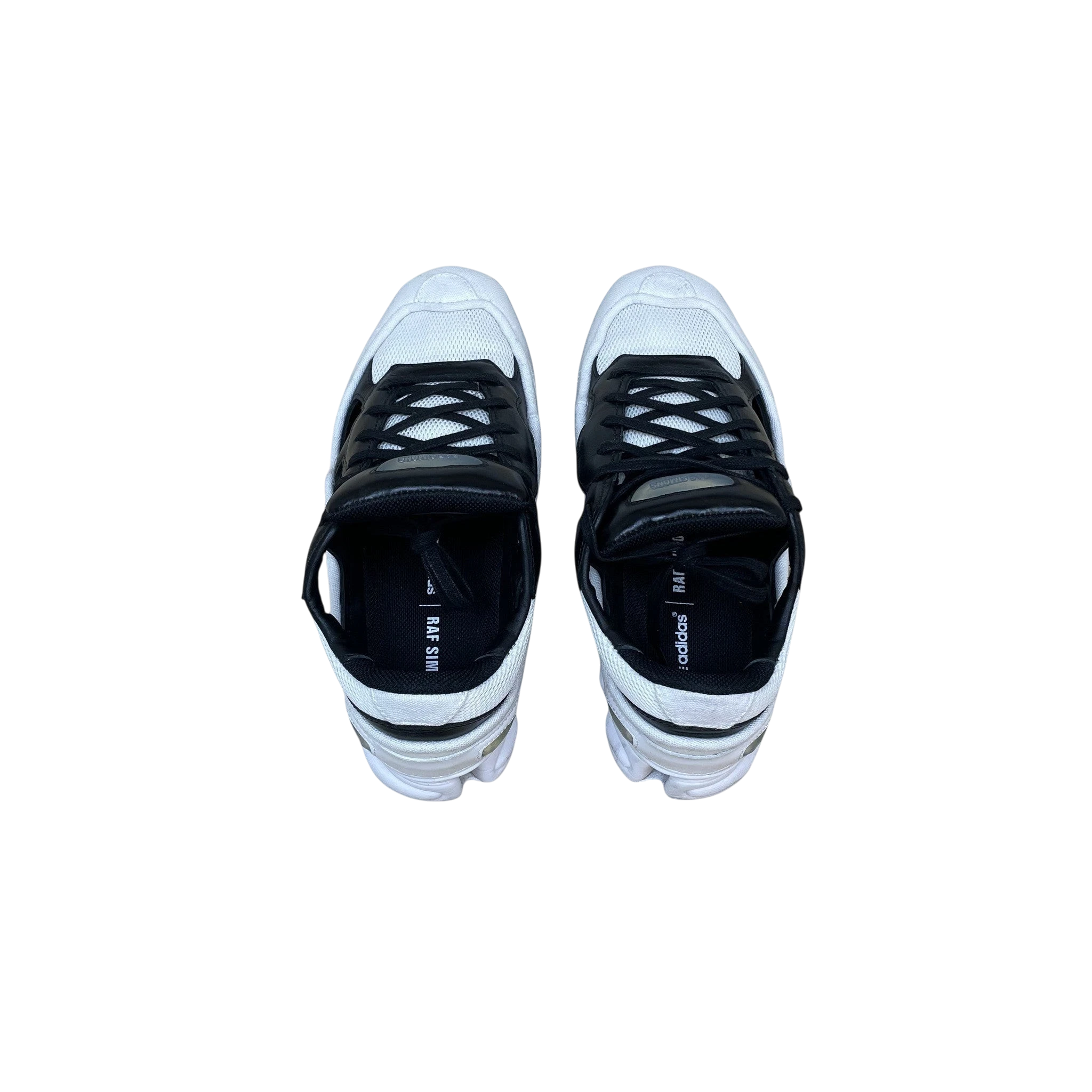 Zenno Archive Adidas x Raf Simons AW18 Ozweego Replicant sneakers in black and cream, top-down view.