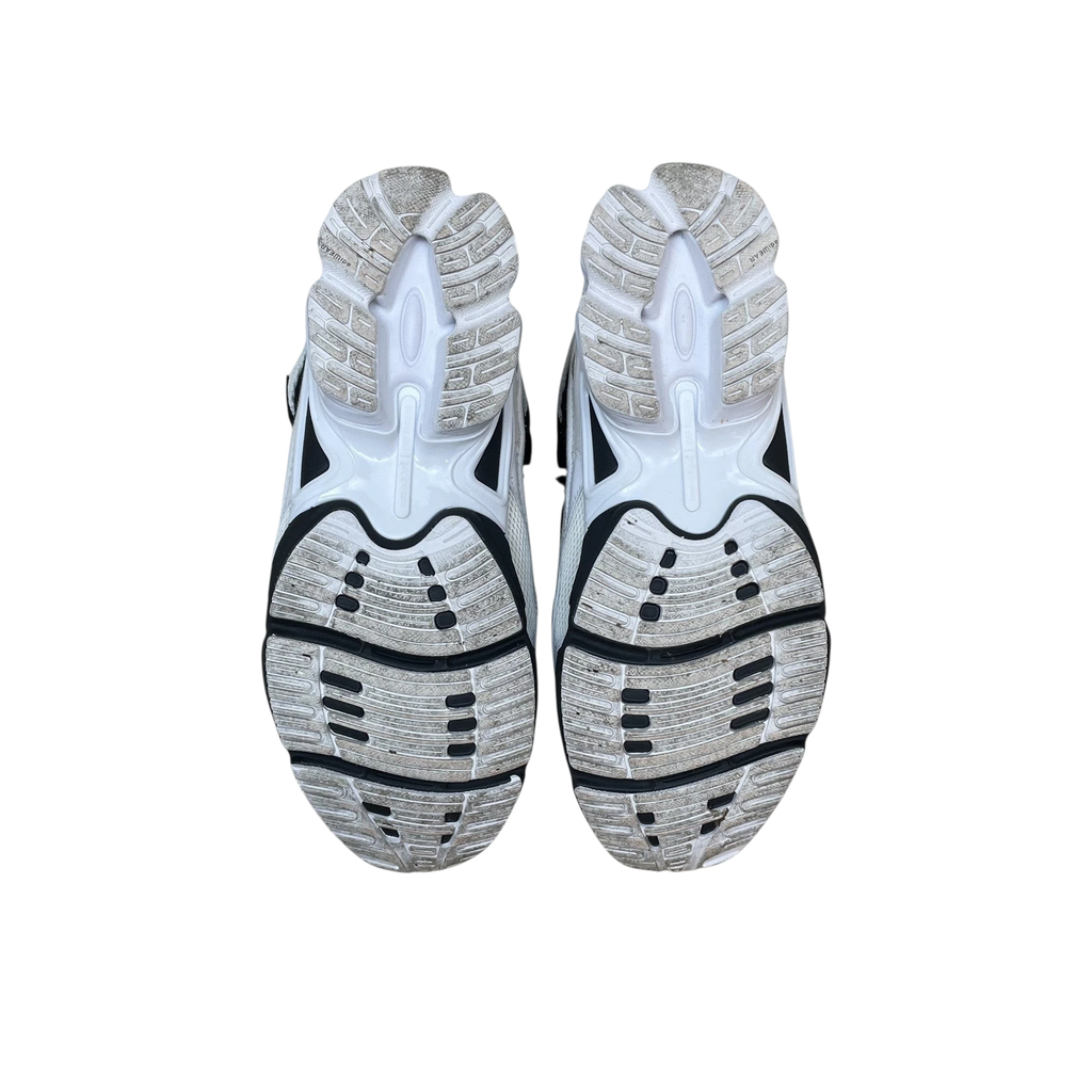 Zenno Archive Adidas x Raf Simons Ozweego Replicant sneakers showing the black and cream textured rubber outsoles