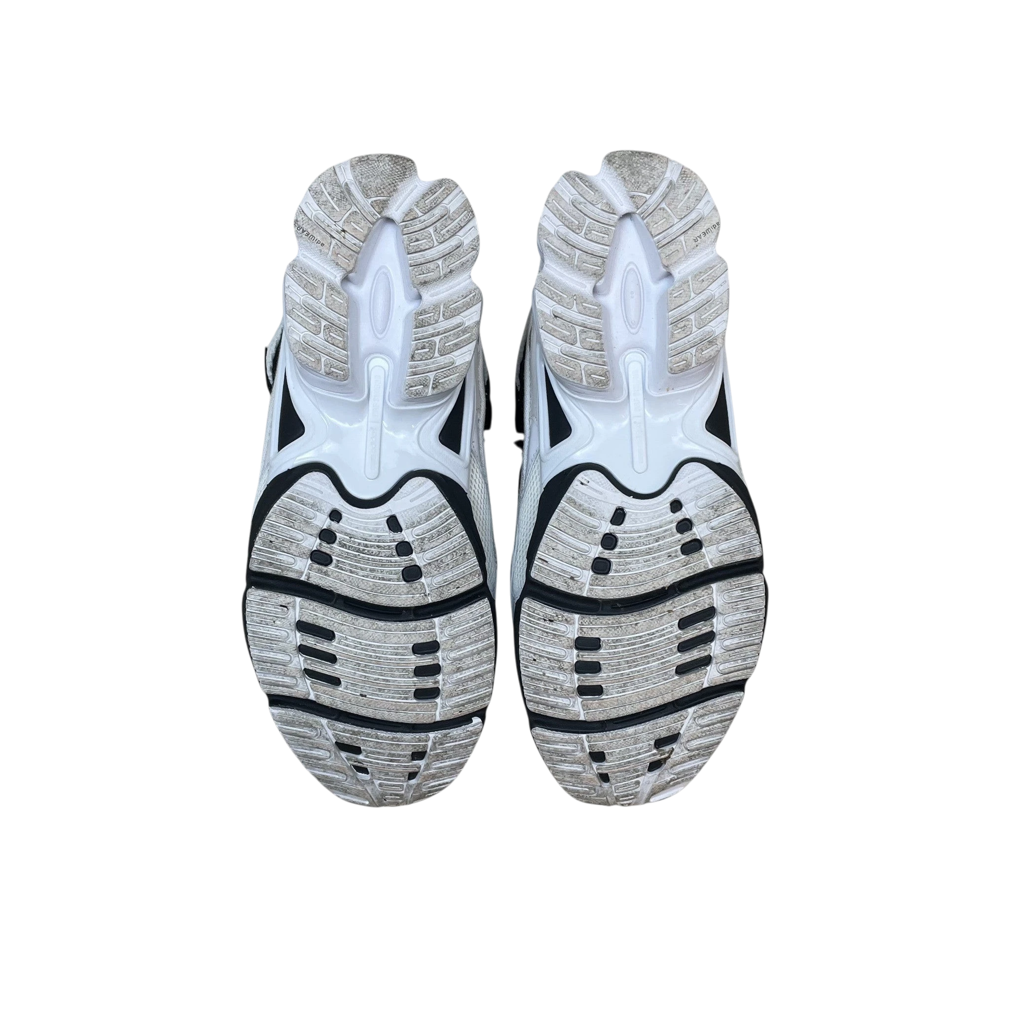 Zenno Archive Adidas x Raf Simons Ozweego Replicant sneakers showing the black and cream textured rubber outsoles