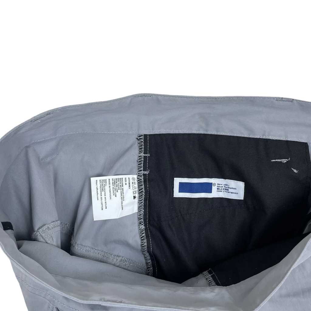 Zenno Archive AFFXWRKS grey nylon cargo pants interior view showing size M label and branding detail