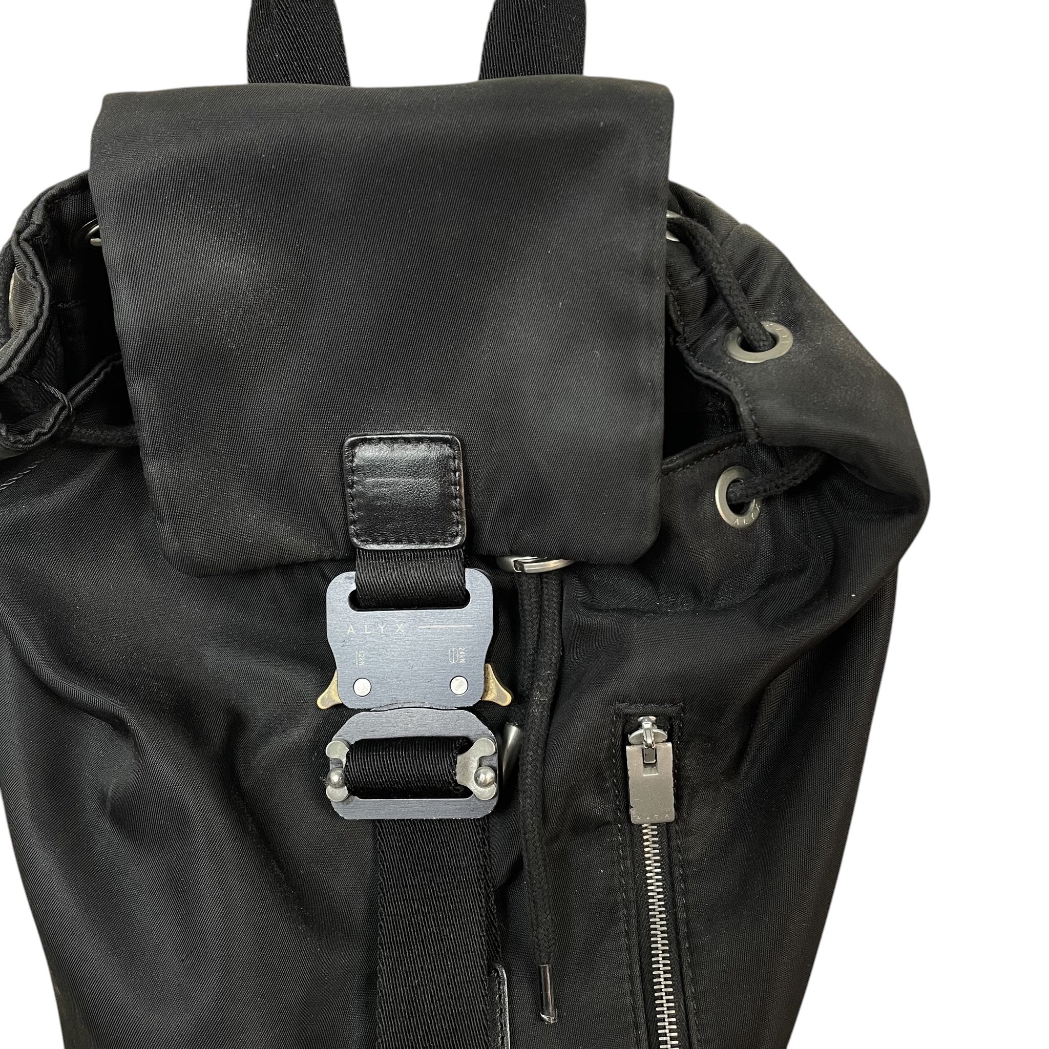 Zenno Archive black nylon backpack featuring signature Alyx metal buckle closure and leather strap details.