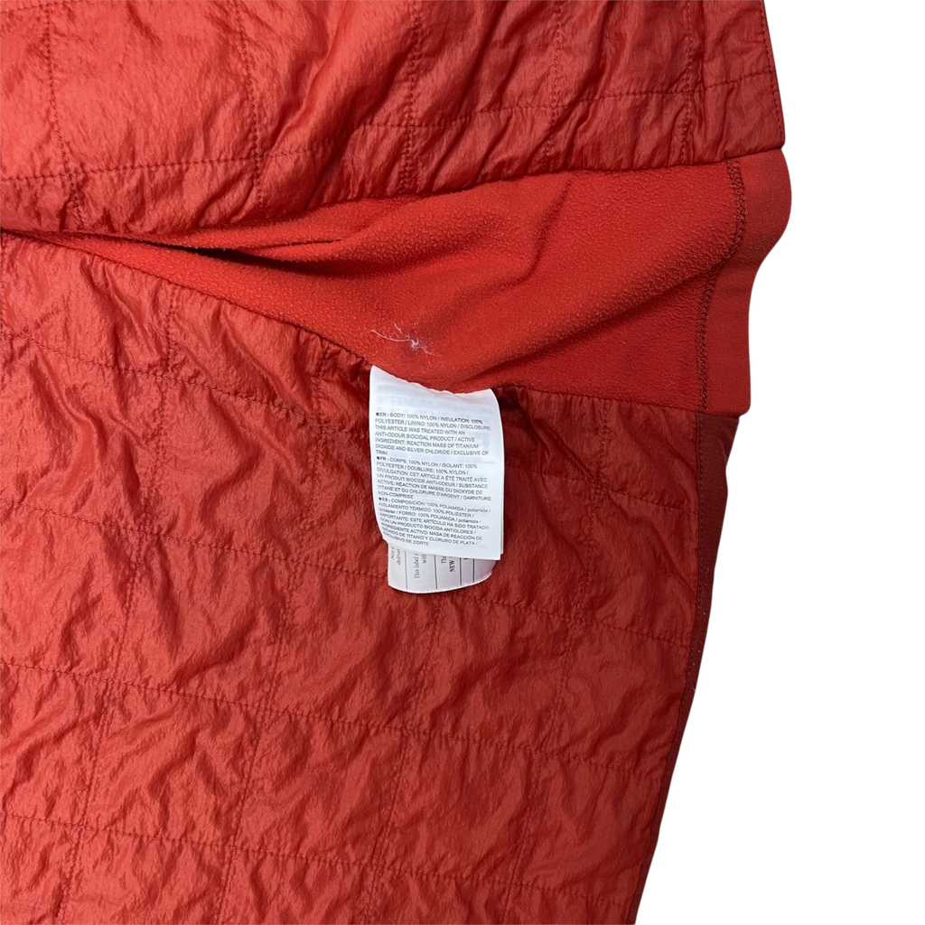 Zenno Archive Arc’teryx Atom SL red quilted jacket interior with care label and soft fleece lining detail