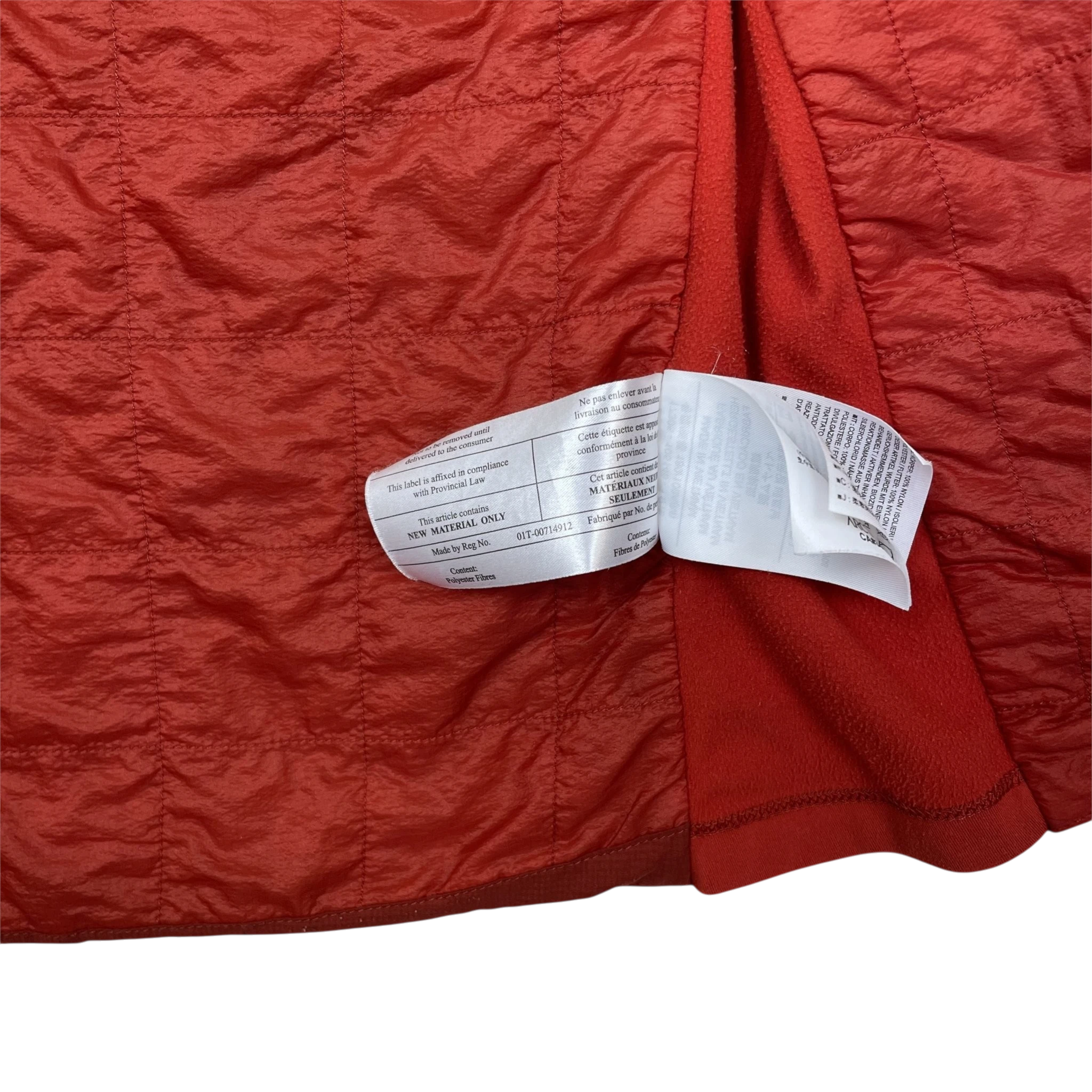 Zenno Archive Arc’teryx Atom SL red quilted jacket interior with care and material labels