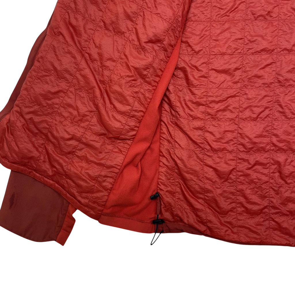 Zenno Archive Arc’teryx Atom SL red quilted hooded jacket interior detail showing fleece lining and drawcord