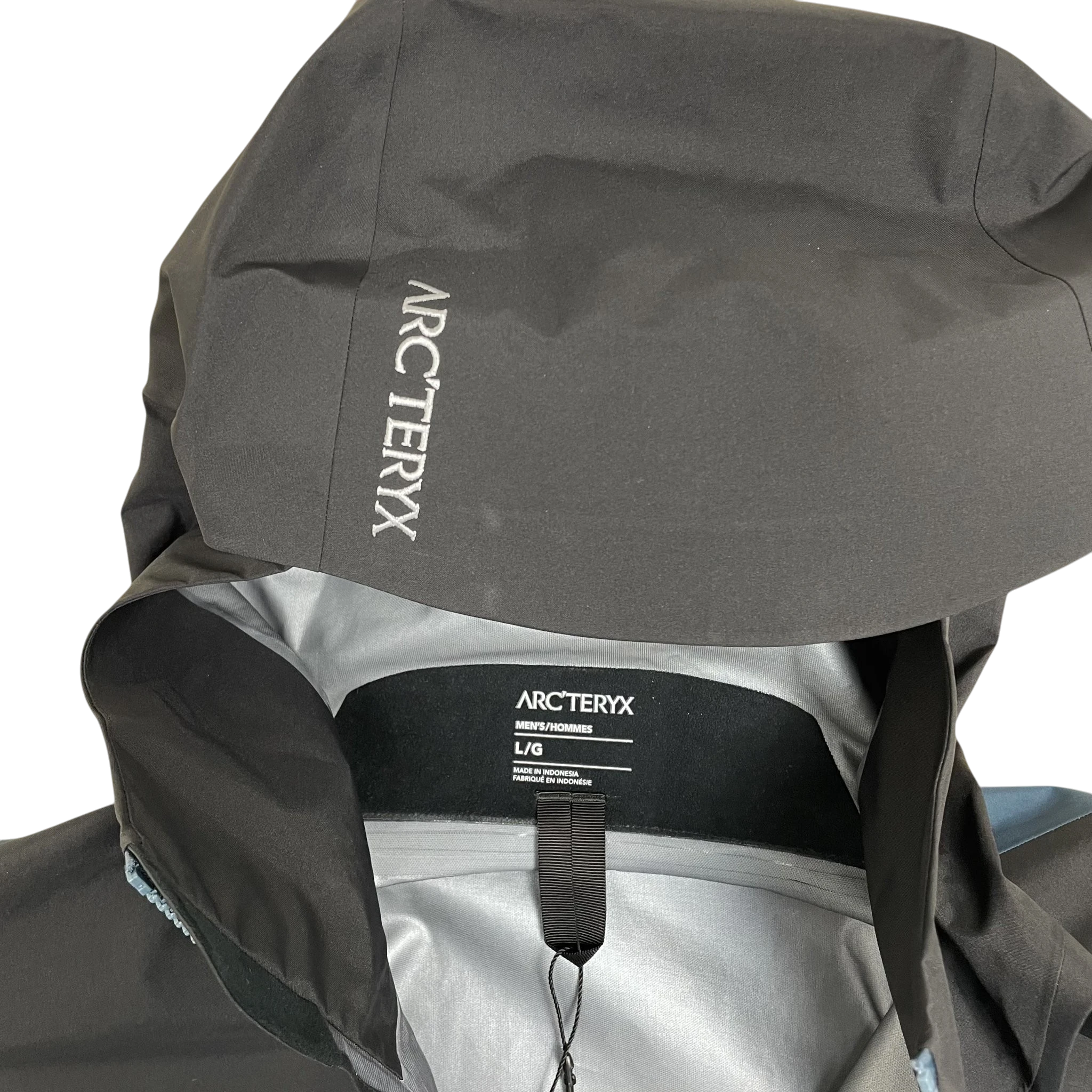 Zenno Archive Arc’teryx Beta Goretex jacket in black and blue with hood logo detail and interior size label