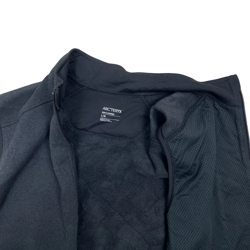Zenno Archive Arcteryx Covert fleece vest in grey, showing the interior lining, collar, and brand label detail.