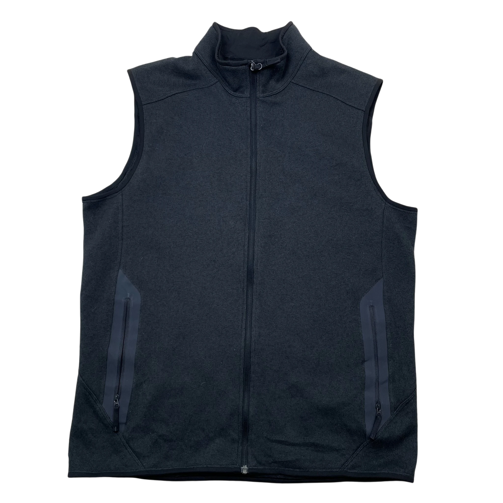 Zenno Archive Arcteryx Covert fleece vest in dark grey with a full zip closure and zippered side pockets.