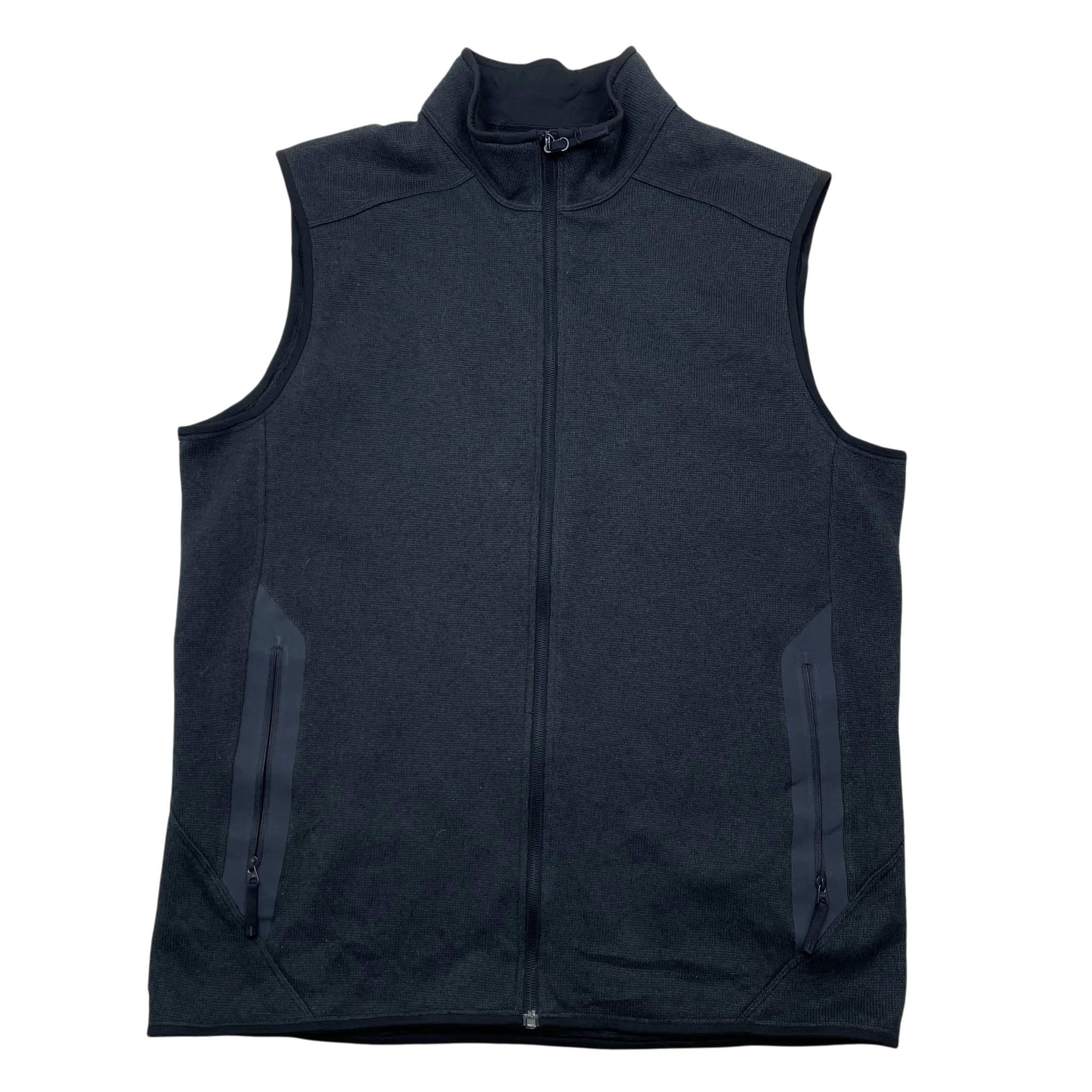 Zenno Archive Arcteryx Covert fleece vest in dark grey with a full zip closure and zippered side pockets.