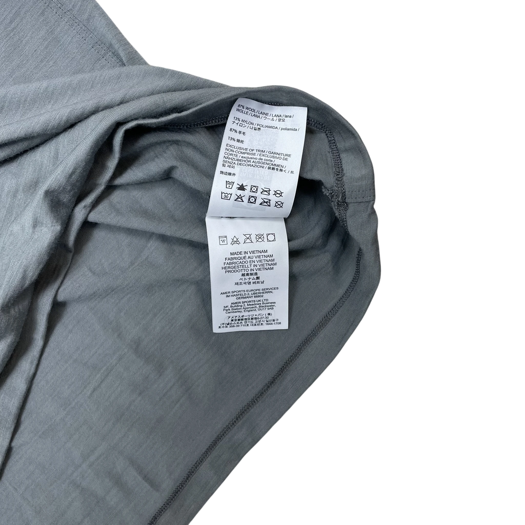 Zenno Archive Arcteryx grey dri-fit t-shirt interior care label showing fabric composition and origin details