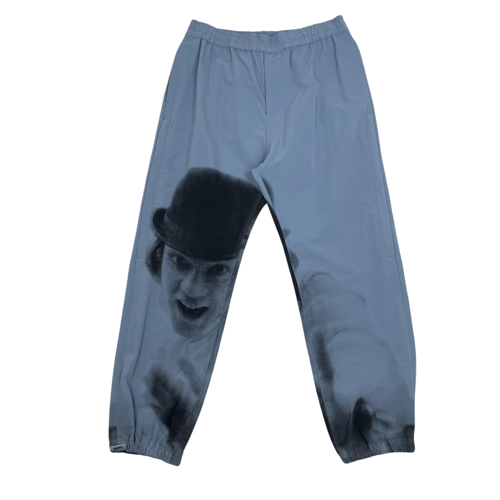 Zenno Archive baby blue track pants featuring a black and white A Clockwork Orange graphic print on the legs.
