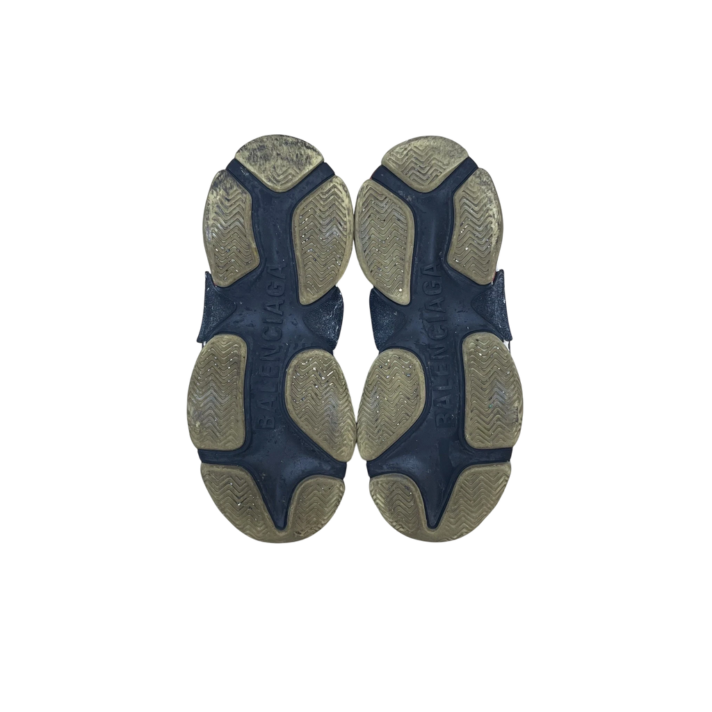 Zenno Archive Balenciaga Triple S sneakers showing the black and beige textured rubber outsoles from below