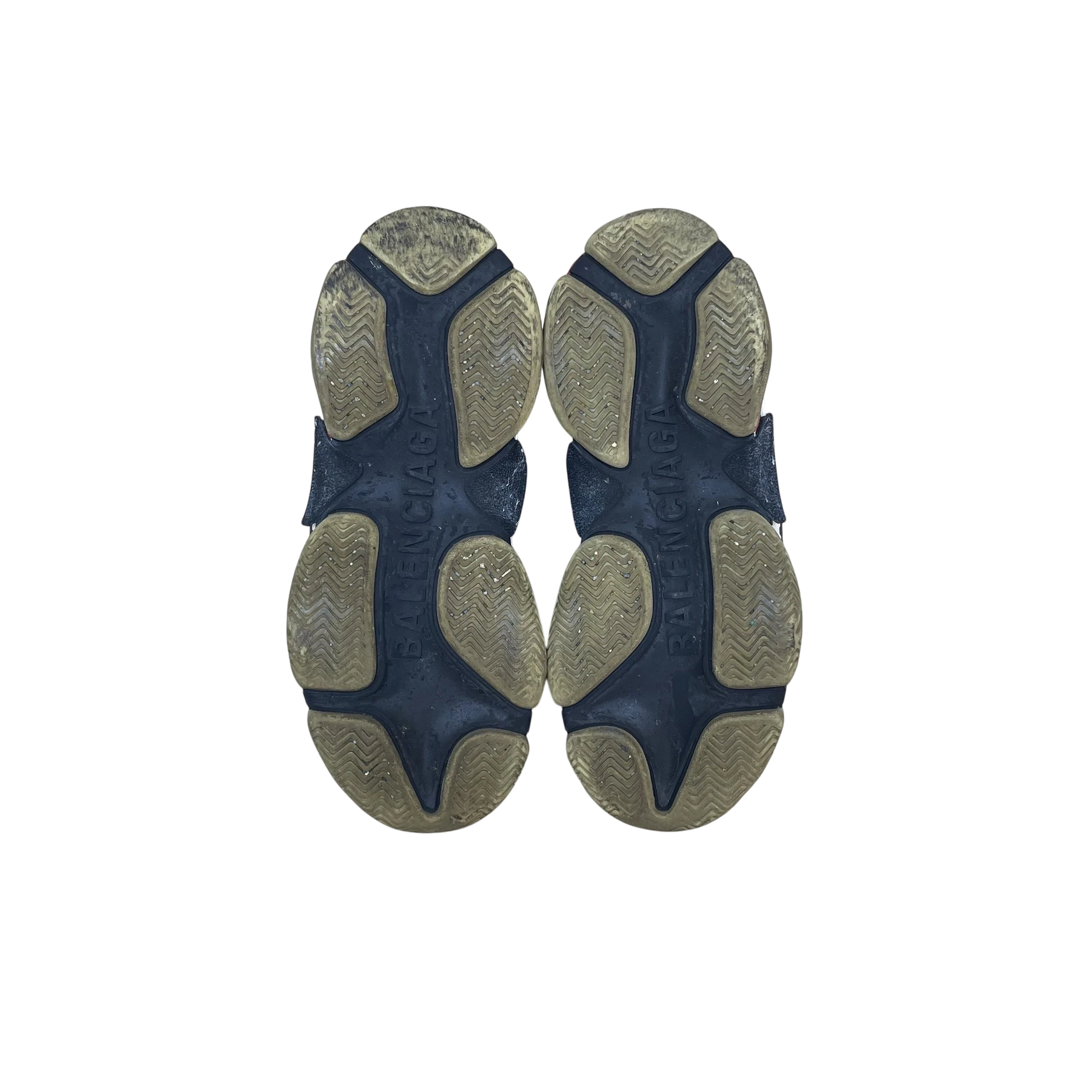 Zenno Archive Balenciaga Triple S sneakers showing the black and beige textured rubber outsoles from below