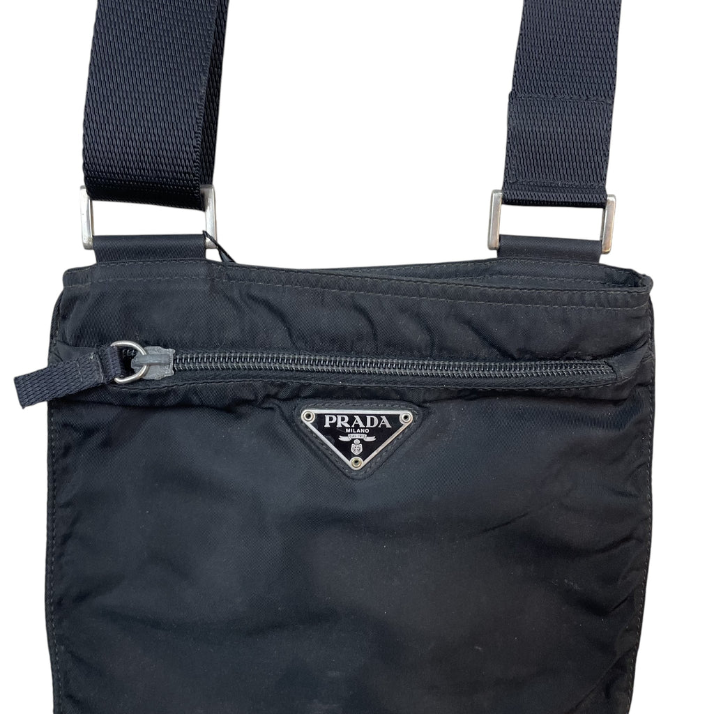 Zenno Archive black Prada nylon cross body bag with front zip pocket and signature triangular logo plaque