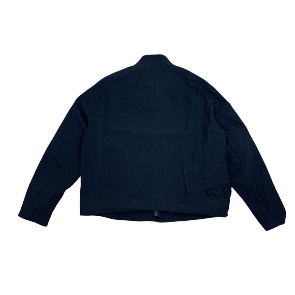 Back view of Zenno Archive Common Divisor Vale stand collar jacket in black with a structured fit