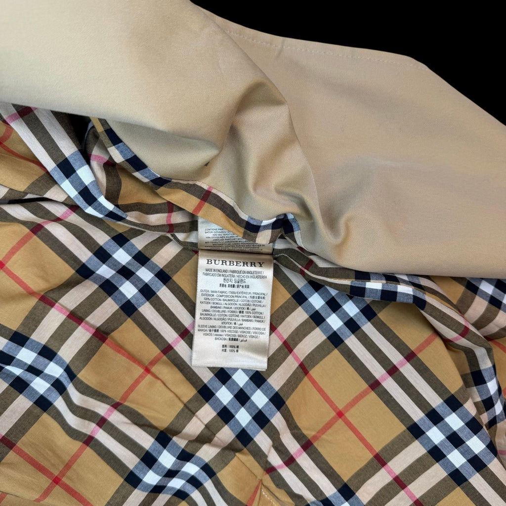 Zenno Archive Burberry Kensington trench coat interior featuring the iconic beige check lining and fabric care label