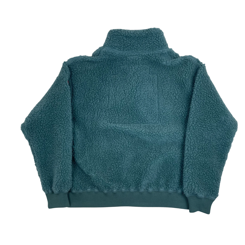 Back view of a turquoise Cav Empt AW23 fleece pullover jumper with a textured sherpa finish from Zenno Archive.