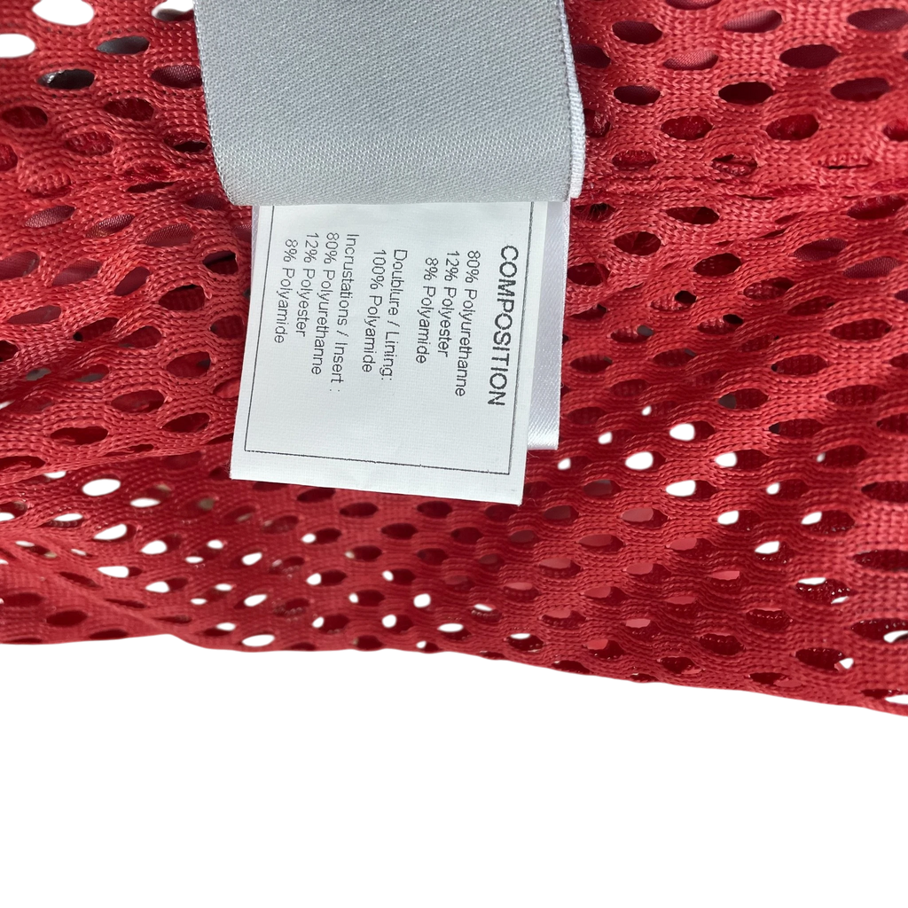 Zenno Archive Chanel Sport 90s red rain coat composition label showing polyurethane and polyamide material details