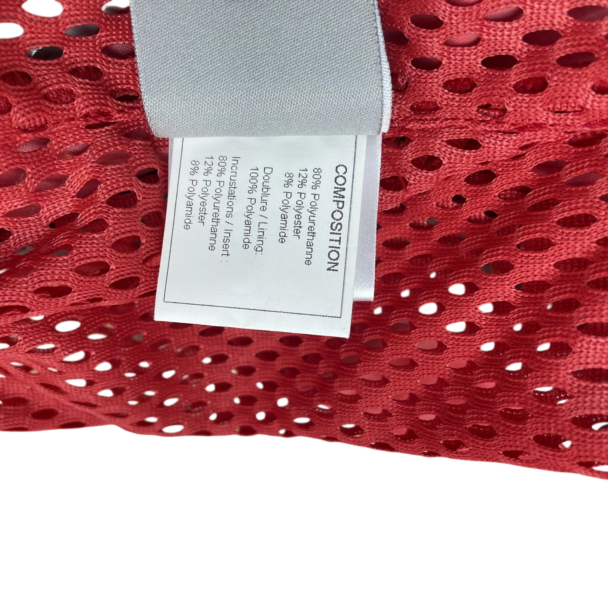 Zenno Archive Chanel Sport 90s red rain coat composition label showing polyurethane and polyamide material details