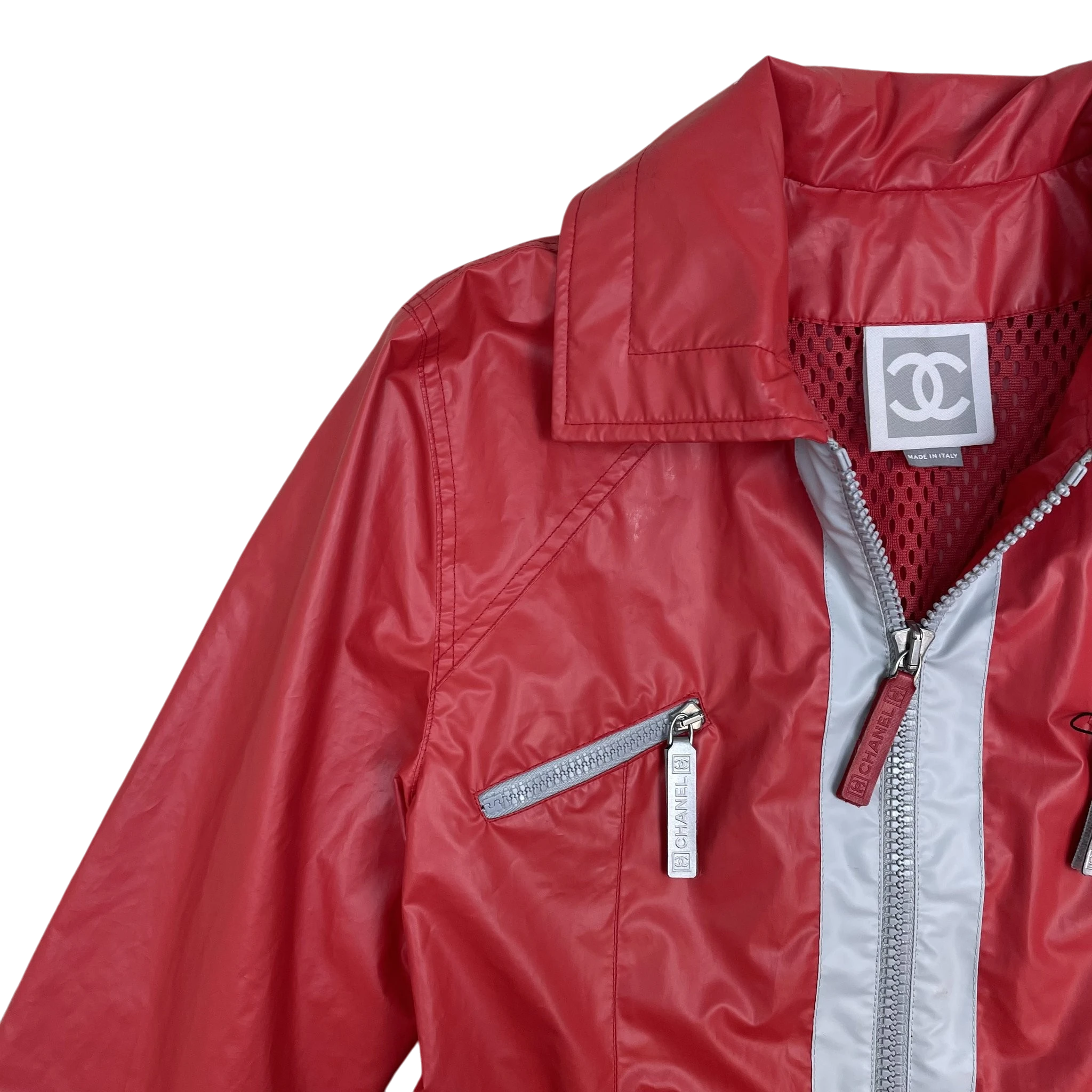 Zenno Archive vintage 90s Chanel Sport red polyester rain coat with branded zipper pulls and mesh lining