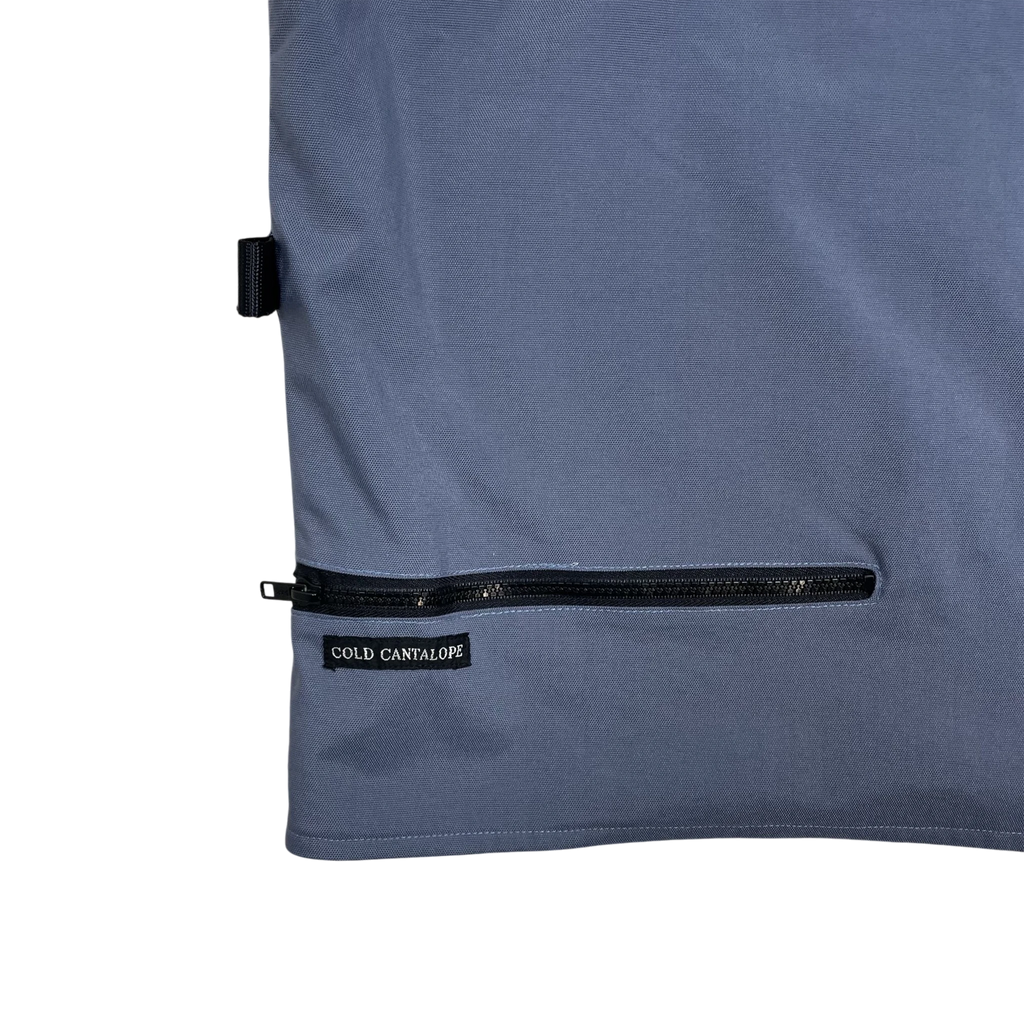 Zenno Archive Cold Cantalope blue technical hooded vest with a zippered pocket and brand label detail