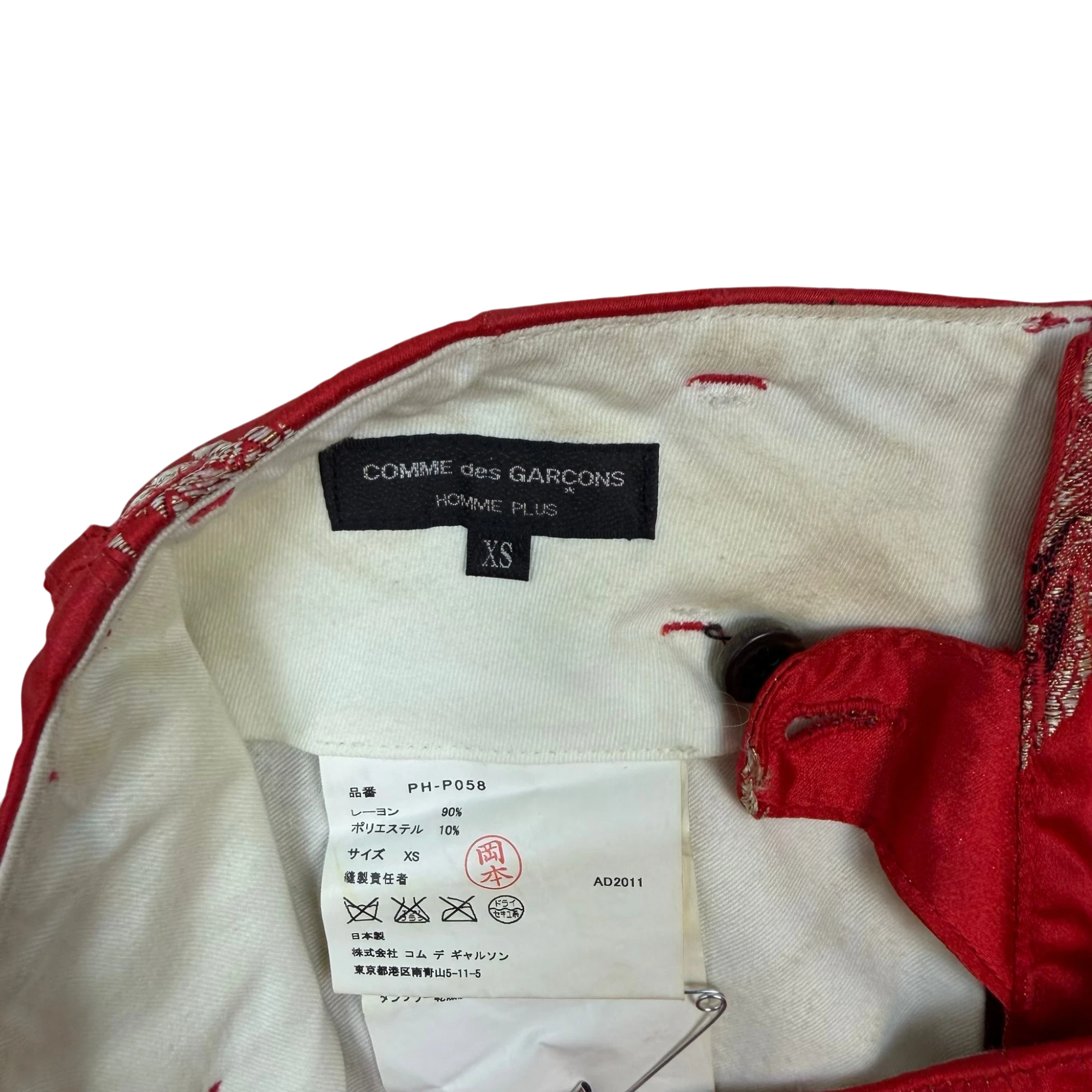 Zenno Archive Comme Des Garçons Homme Plus red satin pants interior label and size tag detail