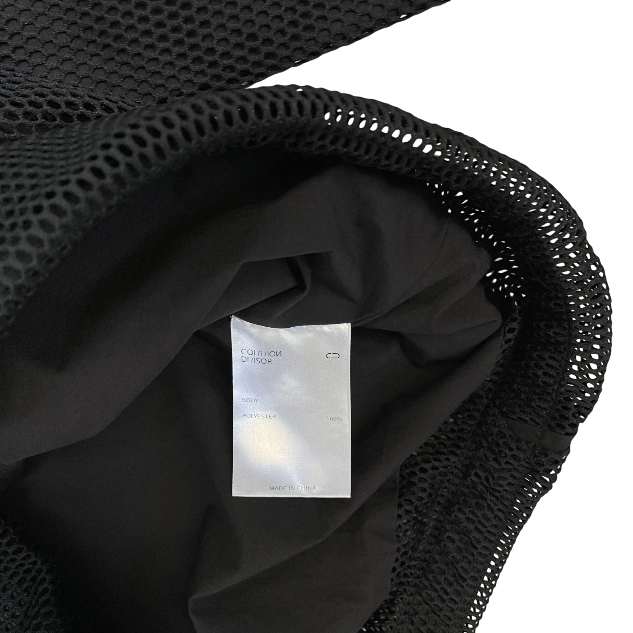 Zenno Archive Common Divisor Contour Jacket black mesh fabric interior with product care label