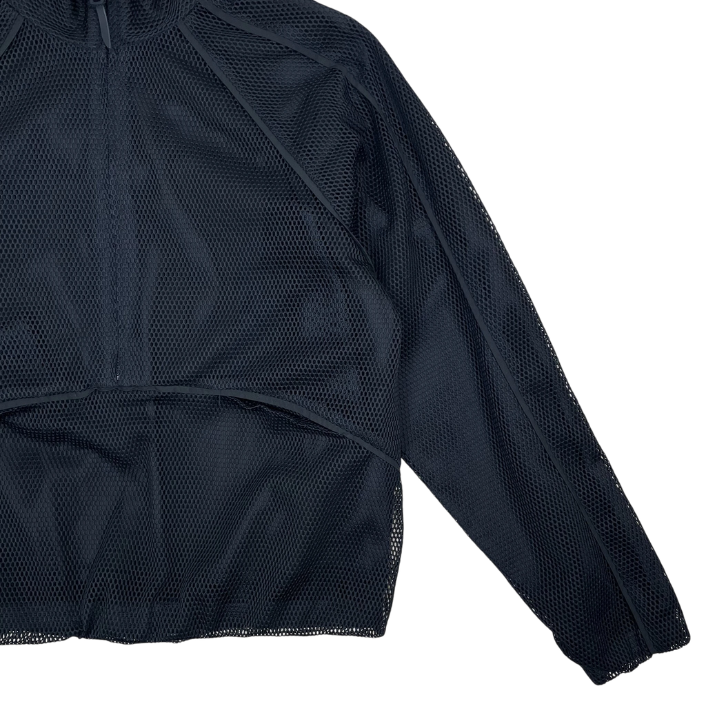 Zenno Archive Common Divisor Contour jacket in black featuring a technical mesh construction and zip-up design.