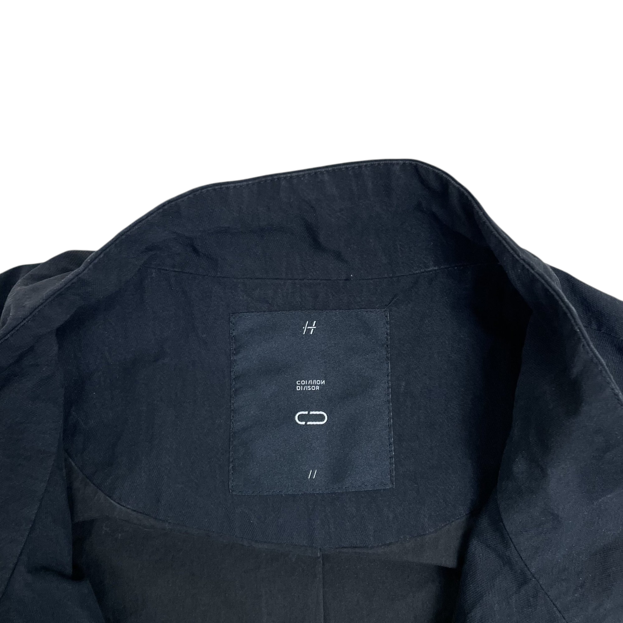 Zenno Archive Common Divisor Vale stand collar jacket in black with interior brand label detail