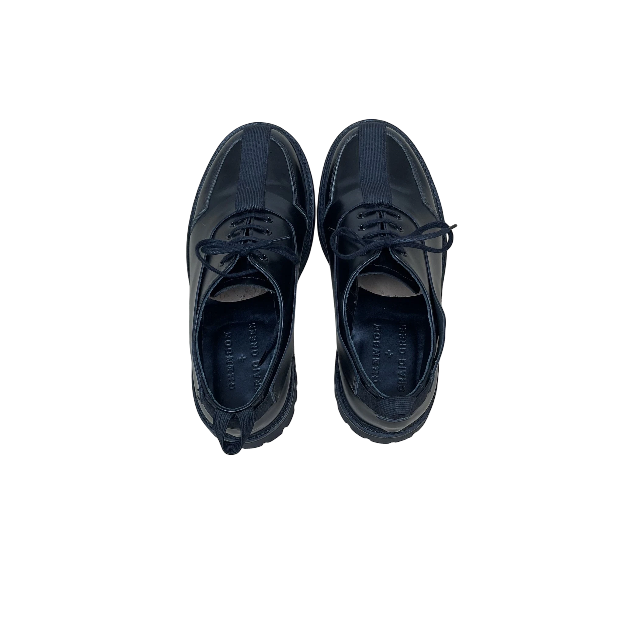 Zenno Archive Craig Green x Grenson black leather Oxford Derby shoes with central webbing detail and lace-up closure.