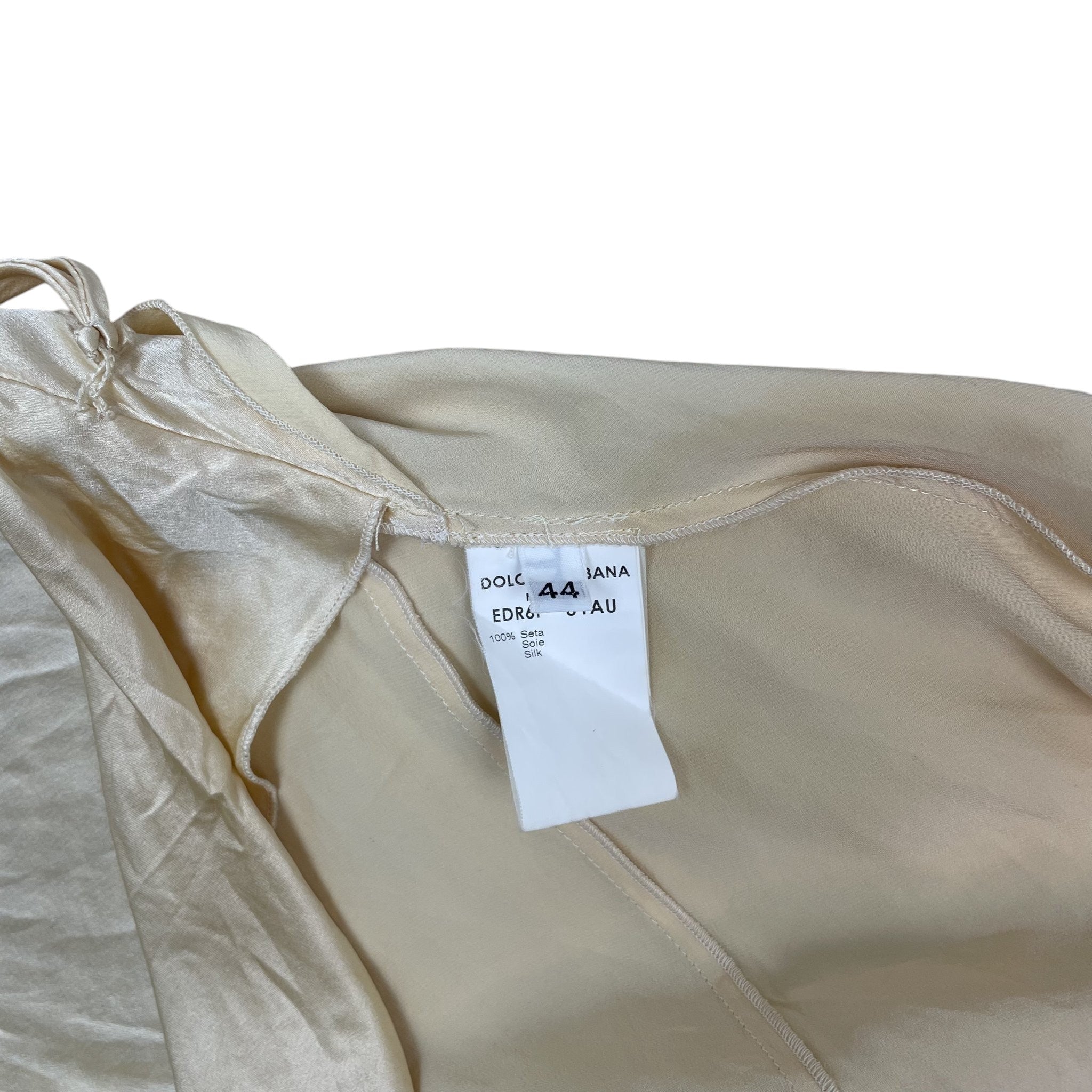 Zenno Archive Dolce & Gabbana Fall 2002 silk mini dress interior label showing size 44 and 100 percent silk fabric