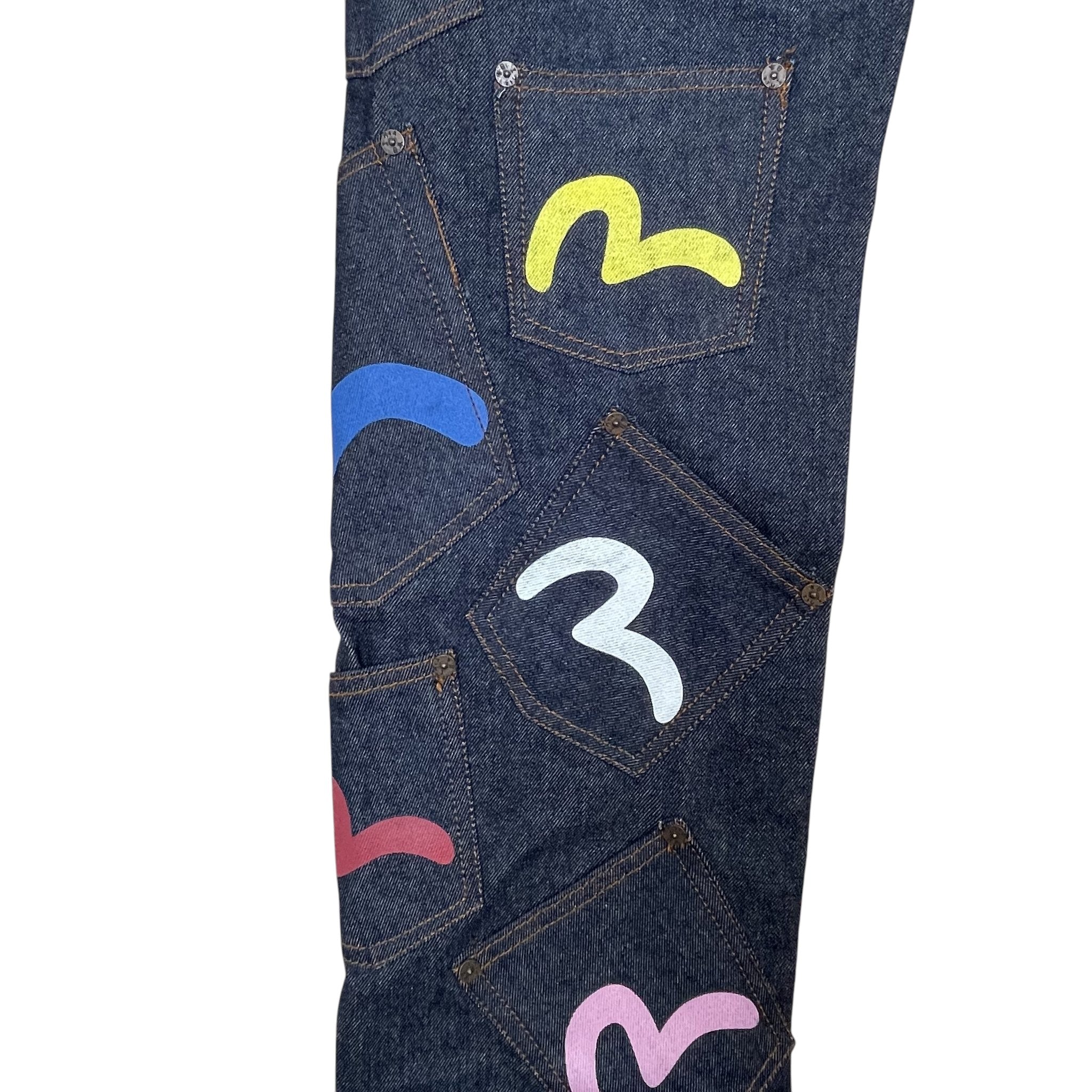 Zenno Archive Evisu dark indigo selvedge denim jeans featuring multiple pockets with colorful painted seagull logos.