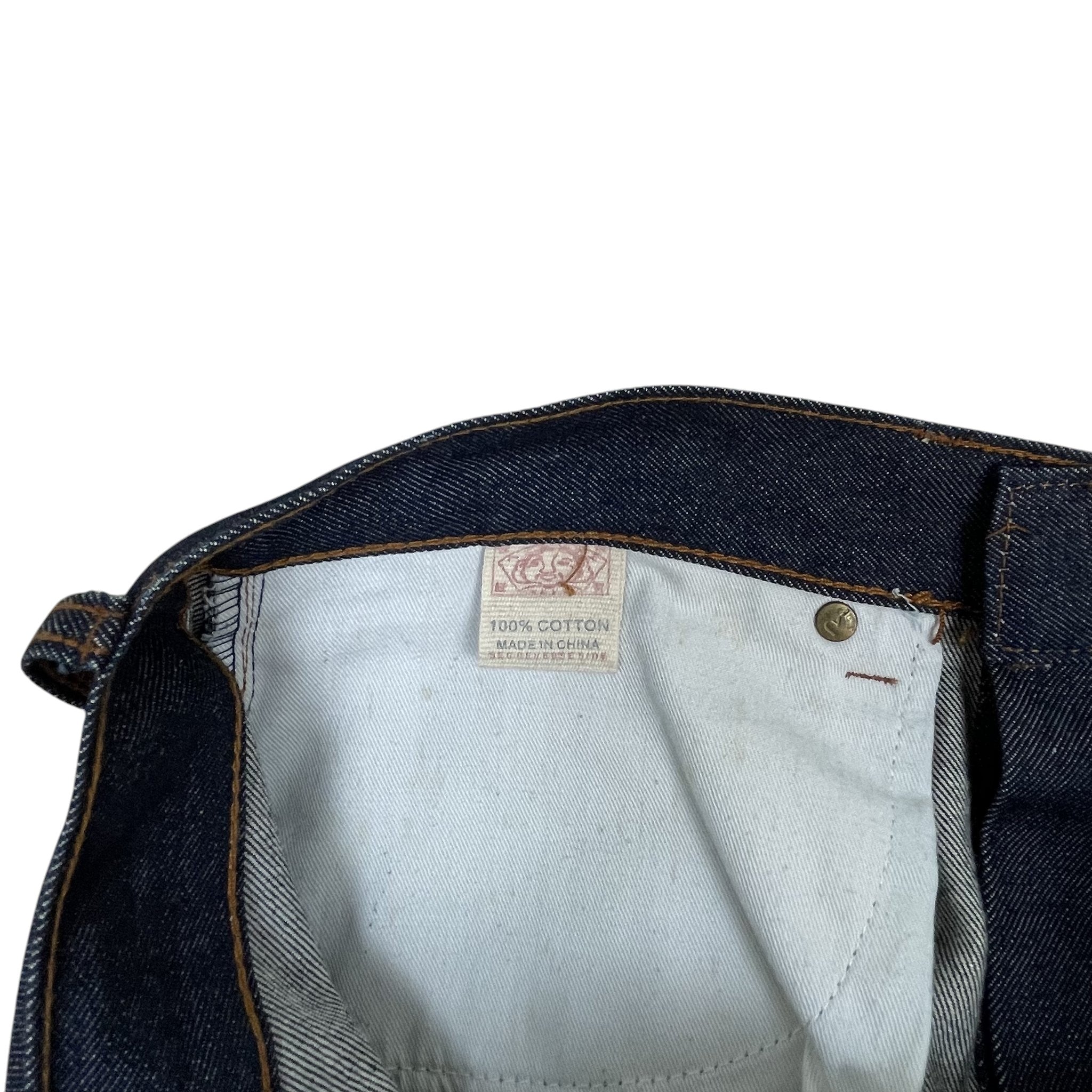 Zenno Archive Evisu selvedge denim jeans interior waistband with 100 percent cotton label and metal rivet