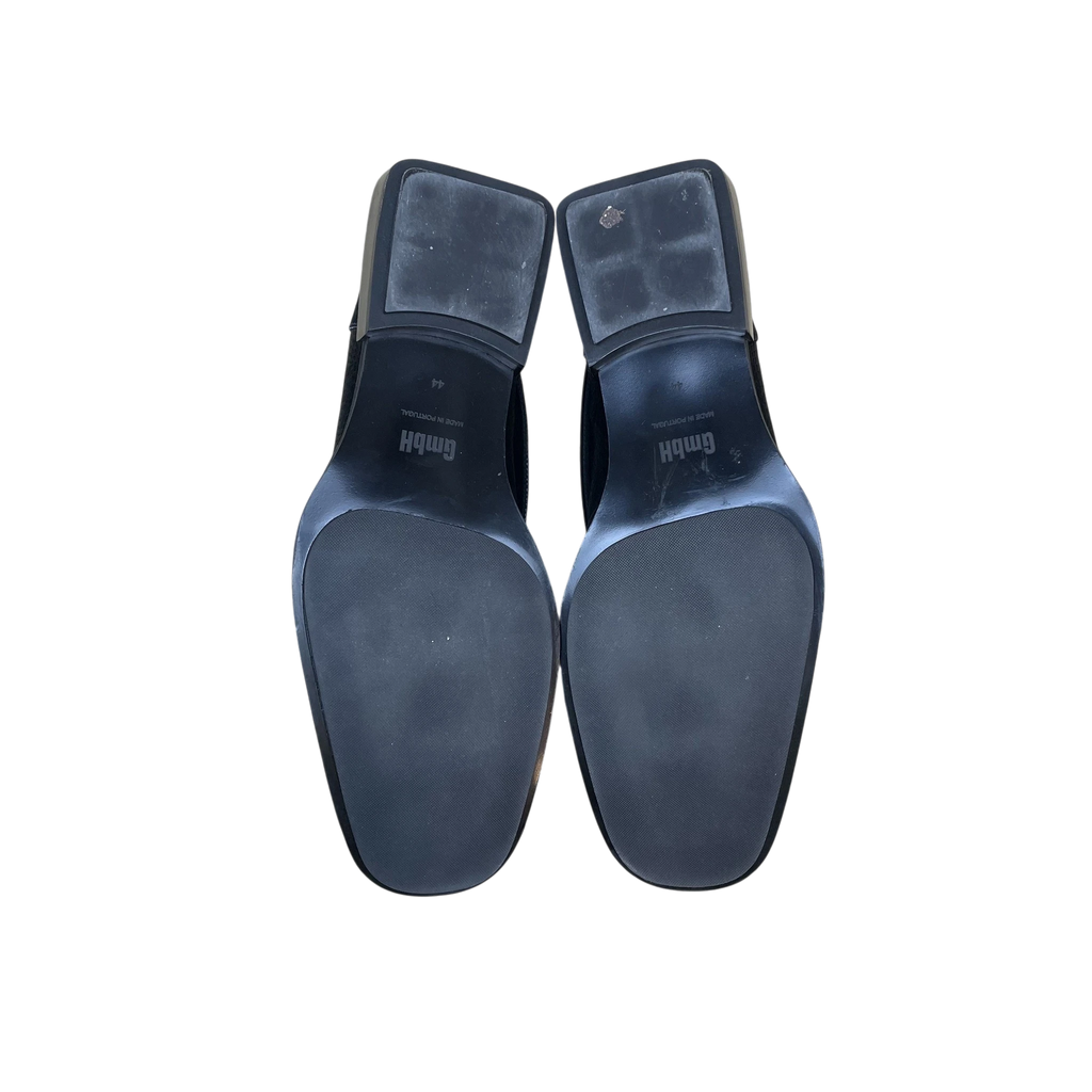 Zenno Archive GmbH black snake chappal loafers showing the rubber soles and block heels from an overhead view