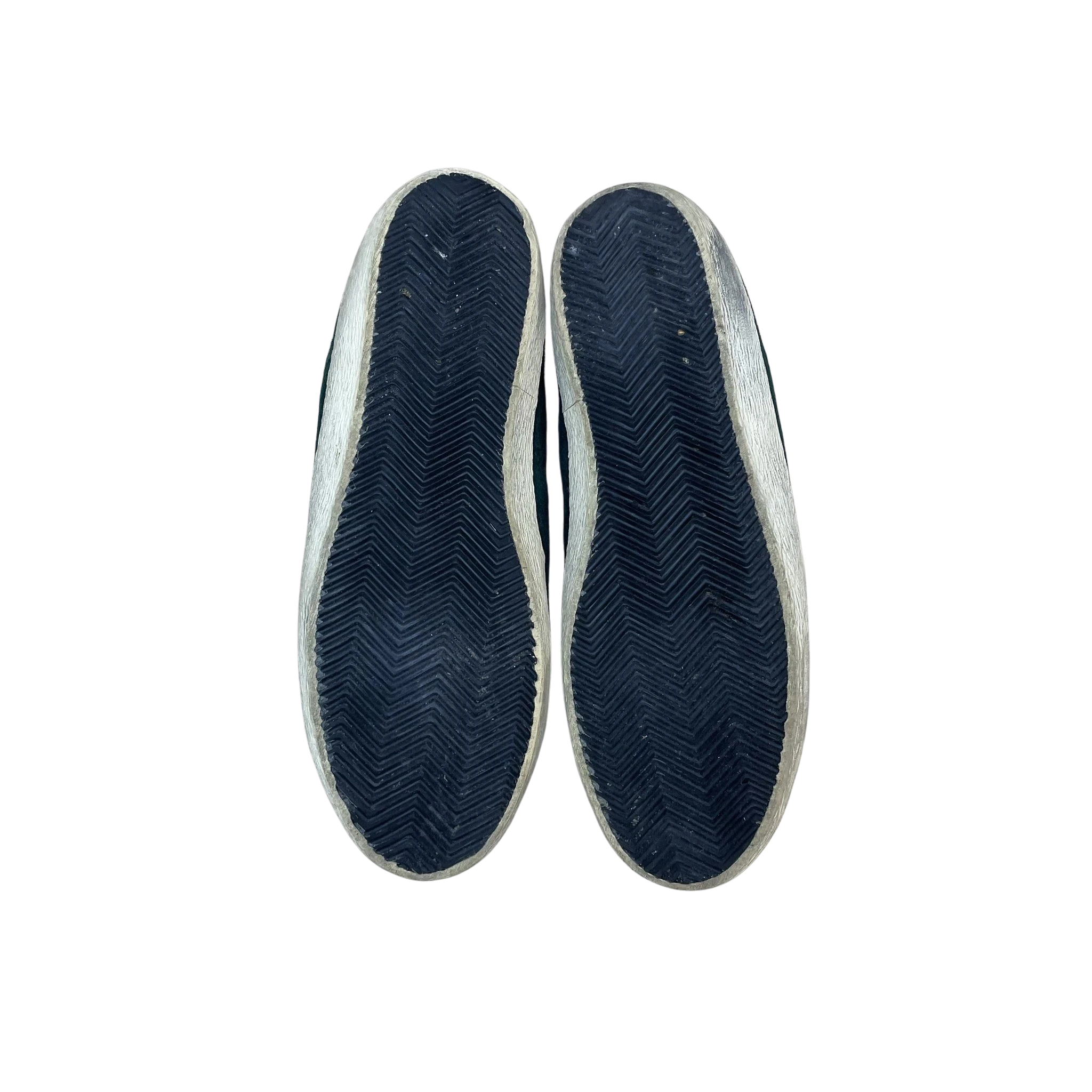 Zenno Archive Golden Goose Super Star suede sneakers in green, showing the black herringbone rubber outsoles.
